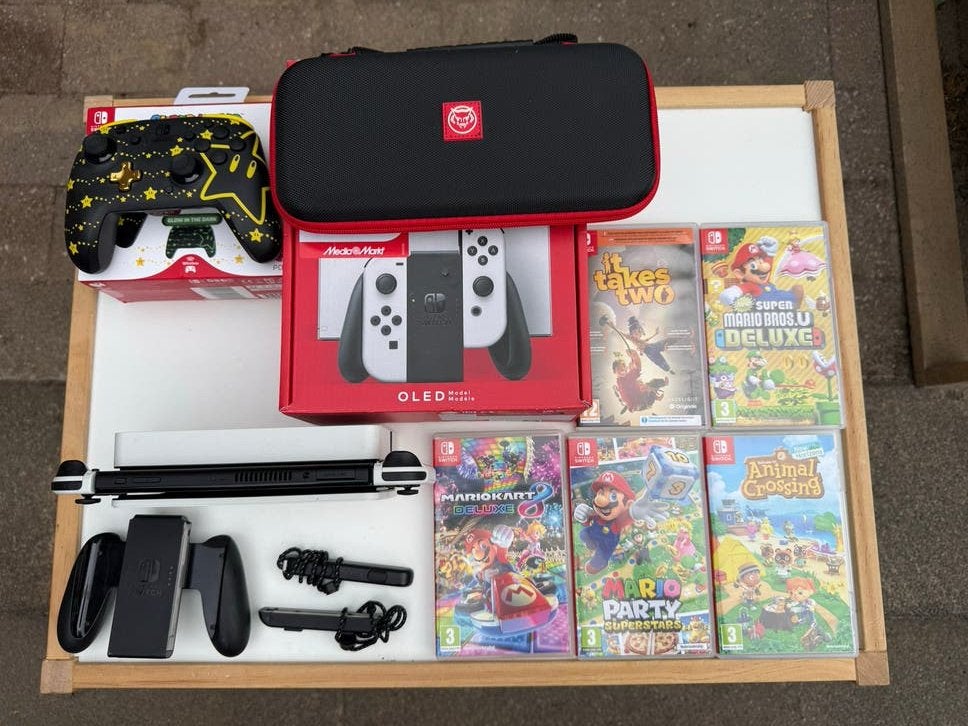 Nintendo Switch OLED met 5 games en extra controller, Met games, Met 2 controllers, Zo goed als nieuw, Switch OLED