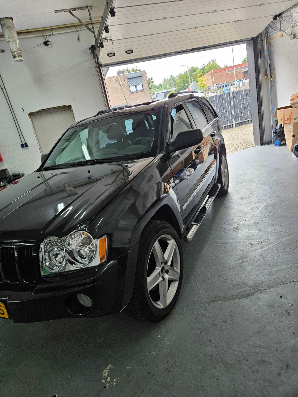 Jeep Grand Cherokee 5.7 I V8 Hemi AUT 2005 Zwart, Auto's, Automaat, Automatische klimaatregeling, 8 cilinders, 5654 cc