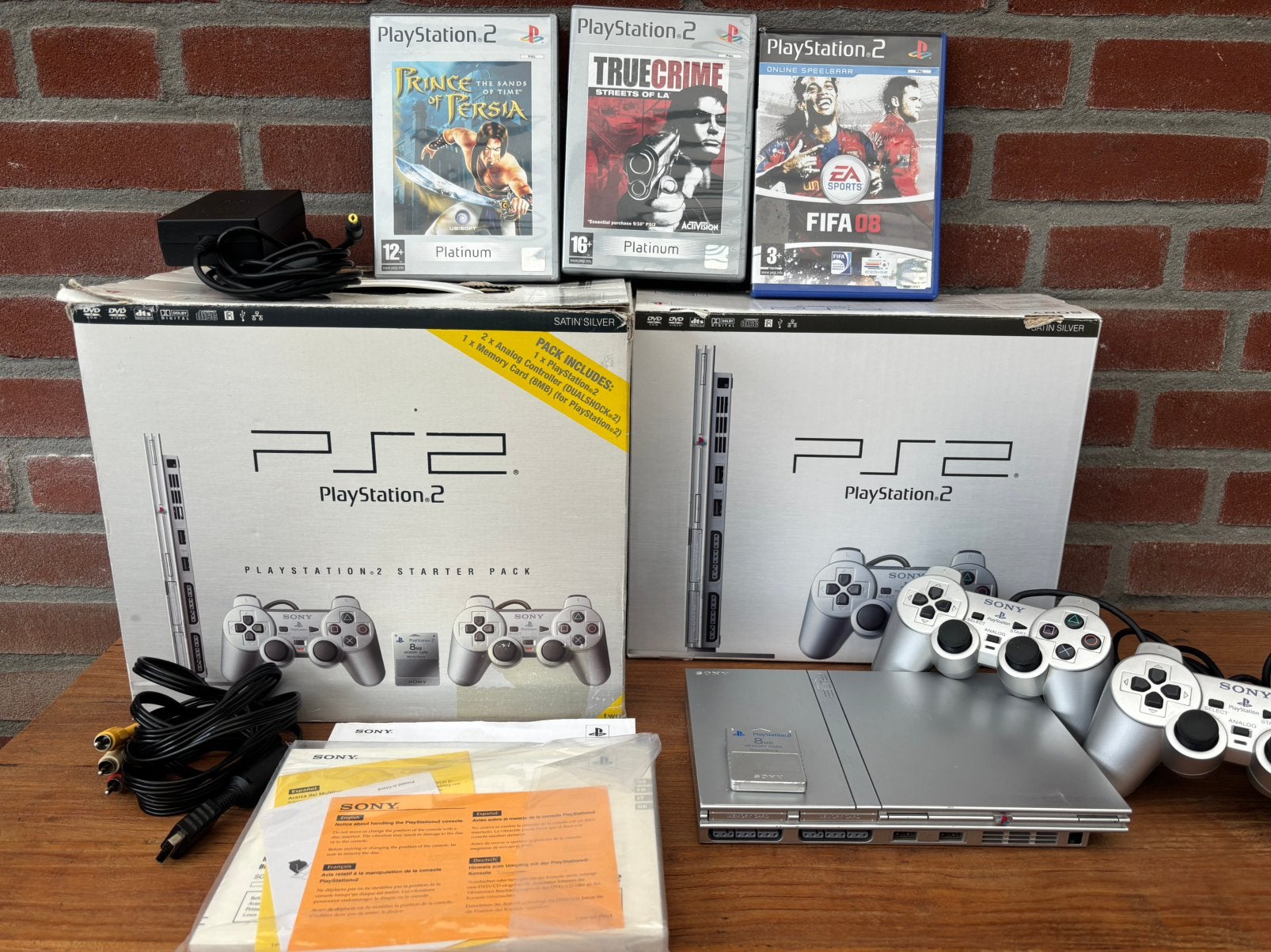 PlayStation Satin Silver Starter Pack, Spelcomputers en Games, Spelcomputers | Sony PlayStation 2, Zo goed als nieuw, Zilver, Met 2 controllers