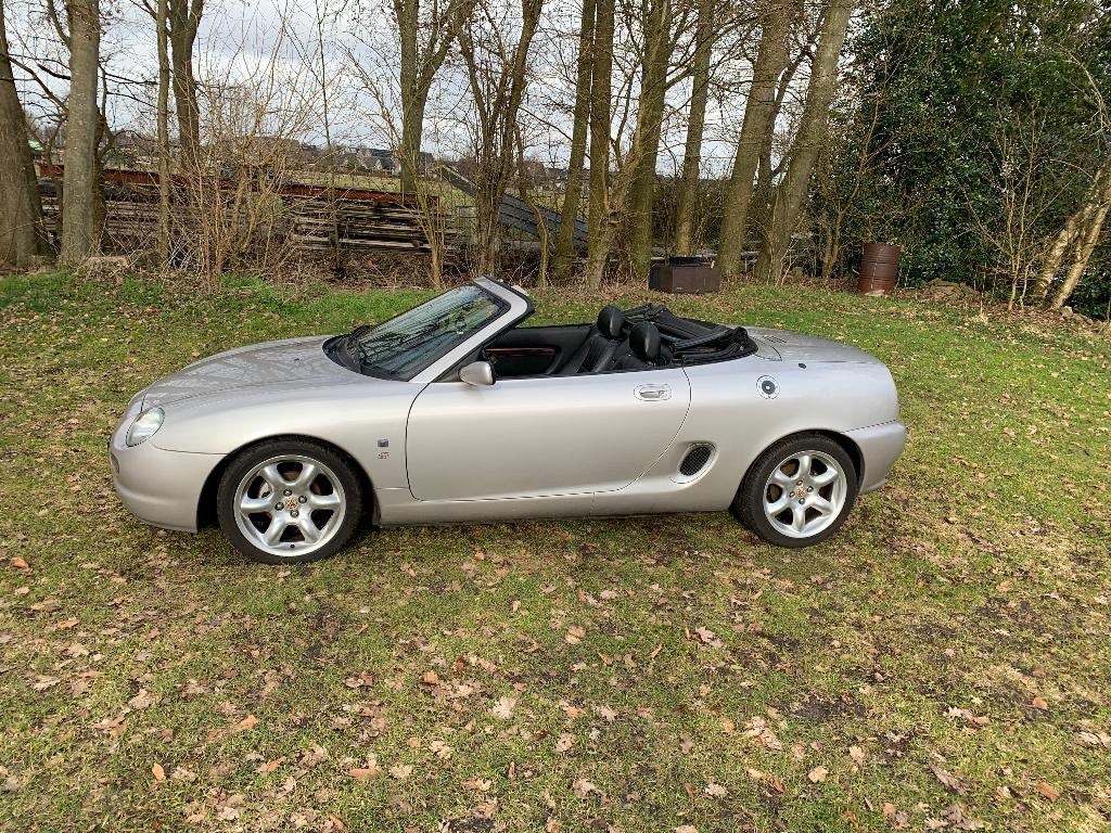 MGF CABRIO IN NIEUWSTAAT LEDER + STOFFEN KAP+ BOEKJES + NAP, Achterwielaandrijving, 40 €/maand, Zwart, 4 cilinders