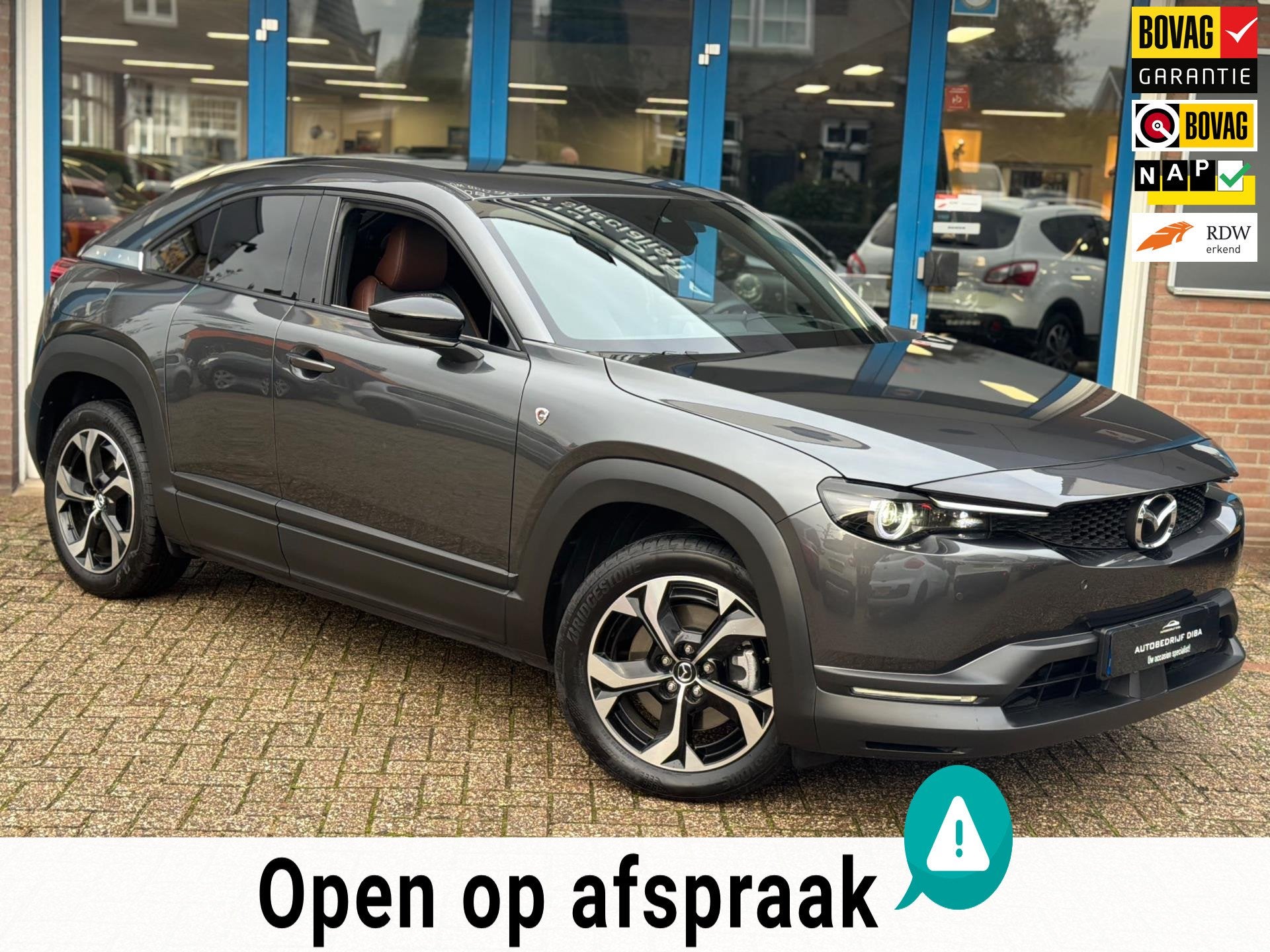Mazda MX-30 E-SkyActiv R-EV 170 Advantage 2025 AUT NAVI NAP, Auto's, Mazda, Dealer onderhouden, Gebruikt, Bedrijf, 1753 kg