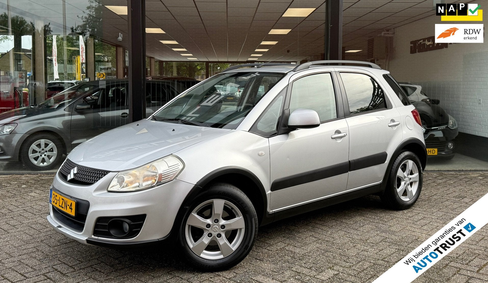 Suzuki SX4 1.6 Exclusive AUTOMAAT | CLIMATE | NAVI | KEYLESS, Euro 5, Stof, Gebruikt, Zwart