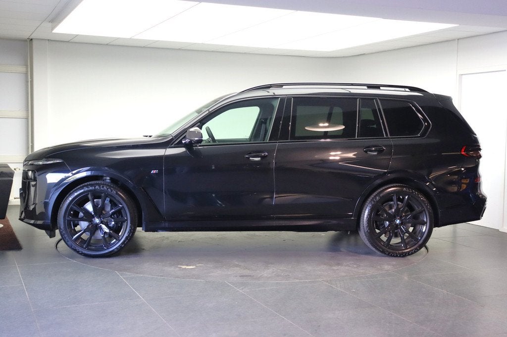 BMW X7 xDrive40i M Sport Automaat / Panoramadak / Trekhaak /, Auto's, BMW, Automaat, Zwart, 7 stoelen, Zwart