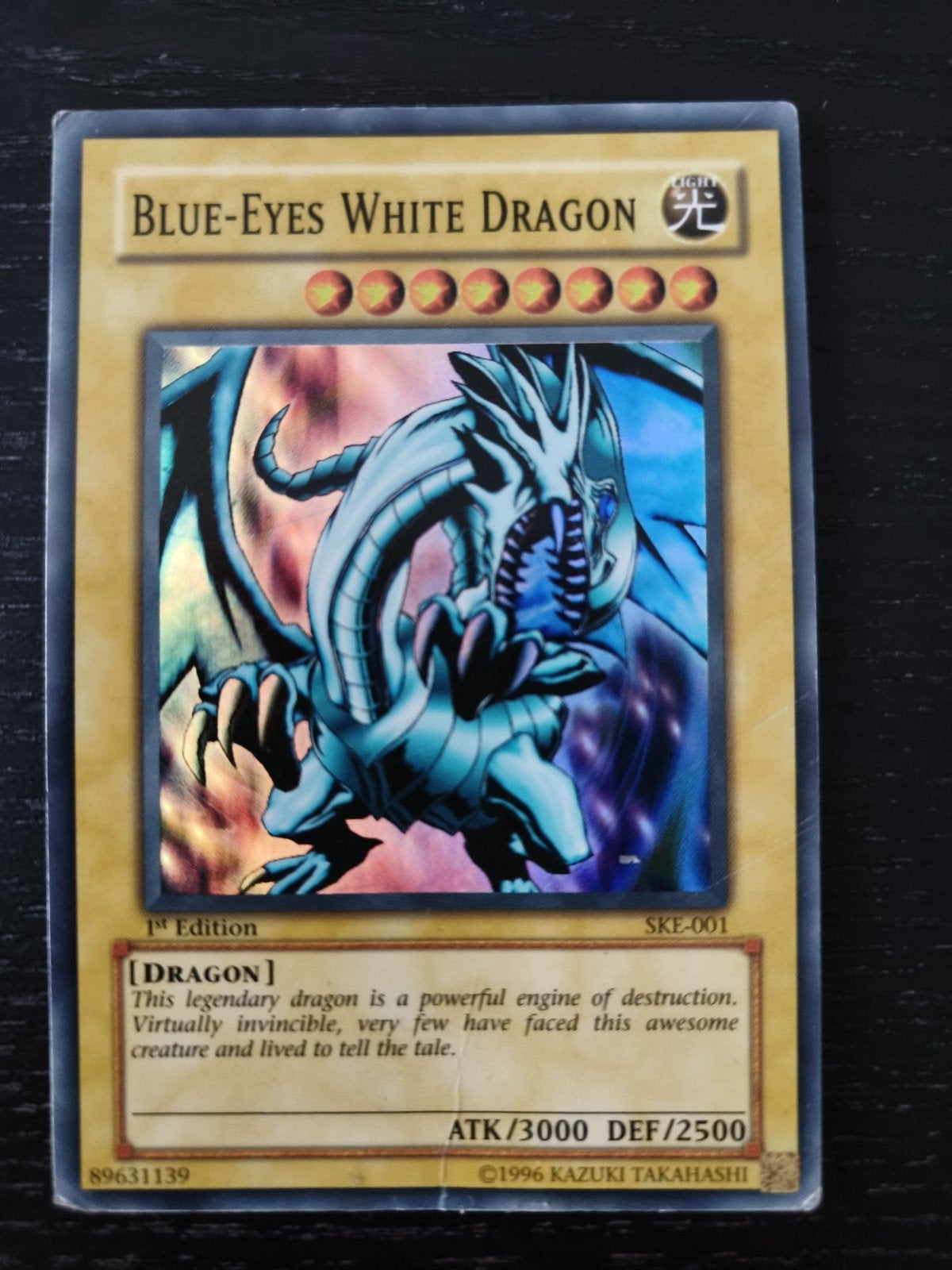 Blue-Eyes White Dragon 1st Edition SKE-001 Yu-Gi-Oh! Kaart, Ophalen of Verzenden, Gebruikt, Losse kaart
