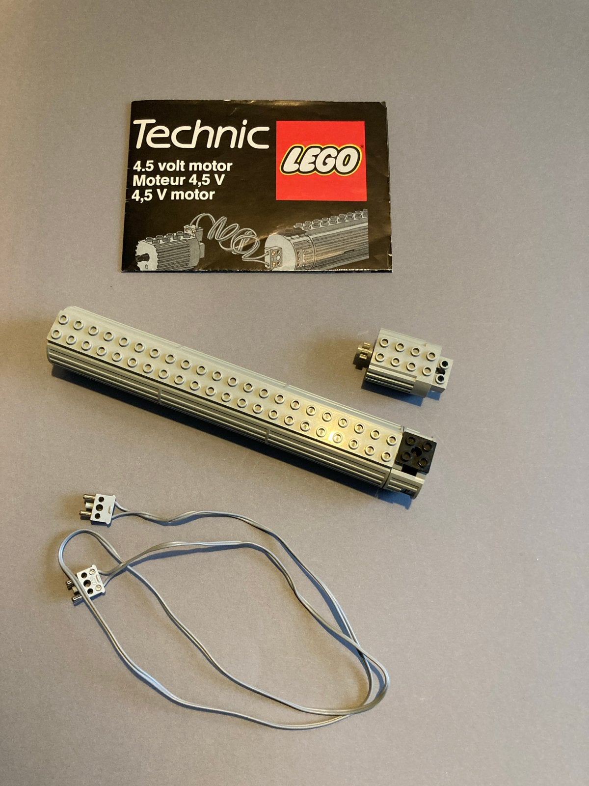 Lego Technic 4,5V motor met batterijhouder en instructies, Kinderen en Baby's, Speelgoed | Duplo en Lego, Gebruikt, Lego, Accessoire