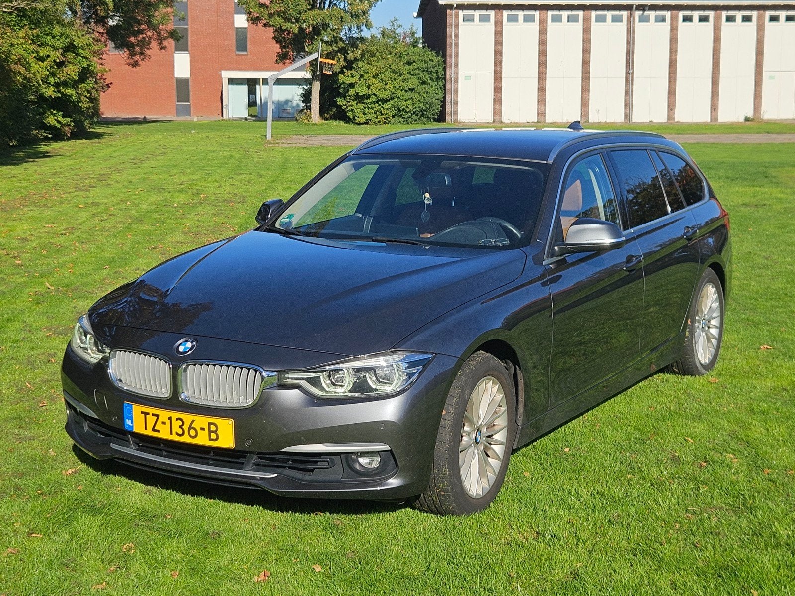 BMW 3-Serie 320i 184pk Aut 2018 Grijs, Achterwielaandrijving, 1800 kg, 4 cilinders, Particulier