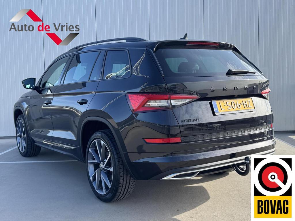 Skoda Kodiaq 1.5 TSI Sportline Business|Trekhaak|NL-Auto, Auto's, Skoda, Voorwielaandrijving, 4 cilinders, 150 pk, Zwart