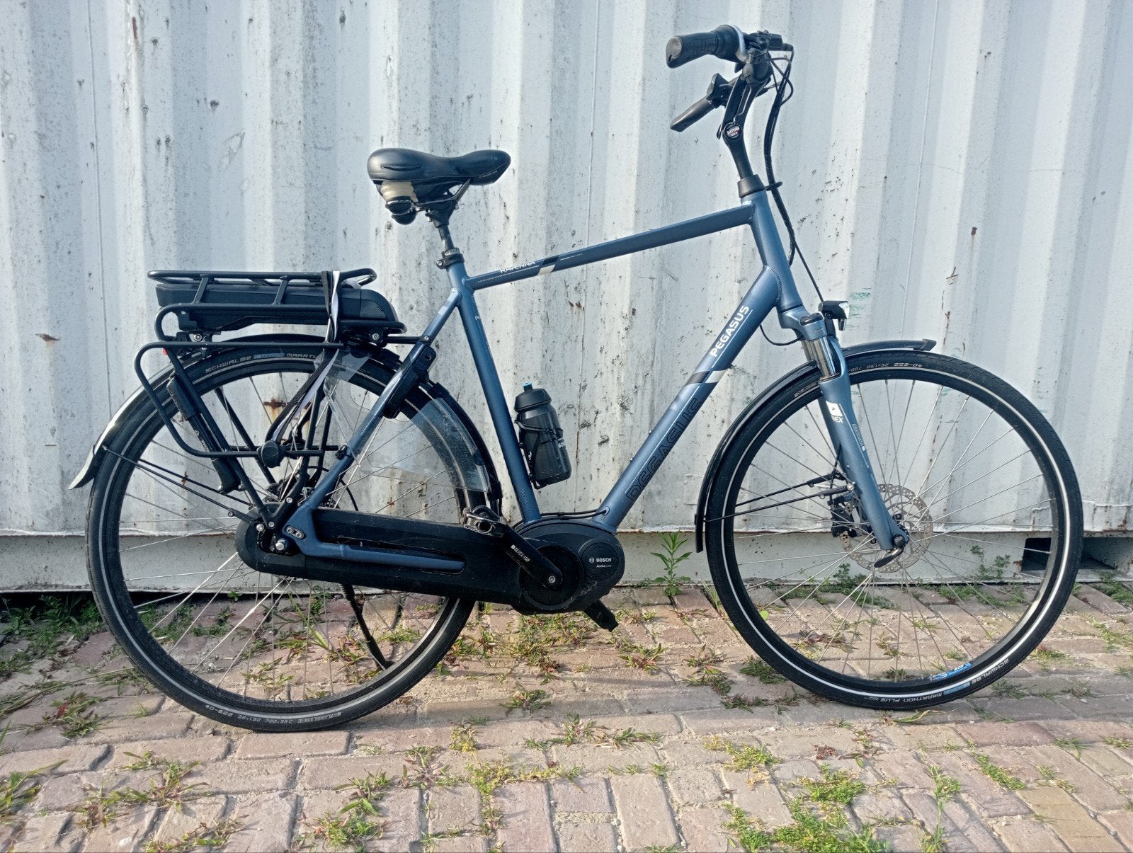 Elektrische heren fiets. Bosch middenmoter, Fietsen en Brommers, Zo goed als nieuw, 59 cm of meer, 50 km per accu of meer, Ophalen