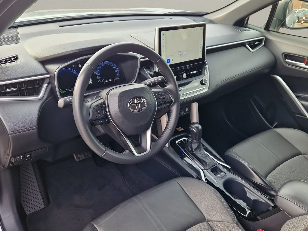 Toyota Corolla Cross 2.0 High Power Hybrid First Edition NL, Auto's, 12 maanden, Gebruikt, 4 cilinders, Leder en Stof