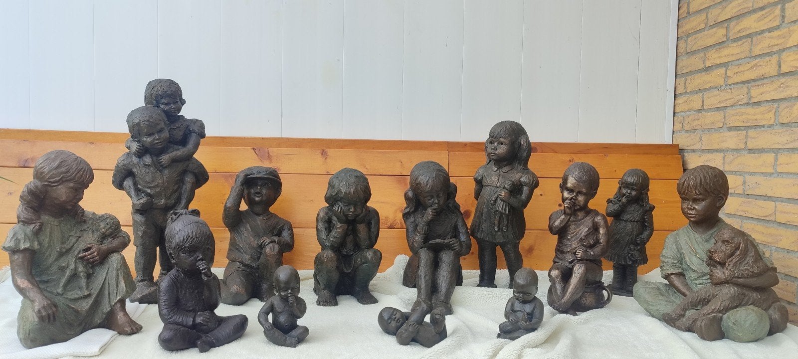 Collectie 13 kinderbeelden van Geert Kunen, brons art deco, Groep mensen, Ophalen of Verzenden, Steen of Keramiek, Beeld
