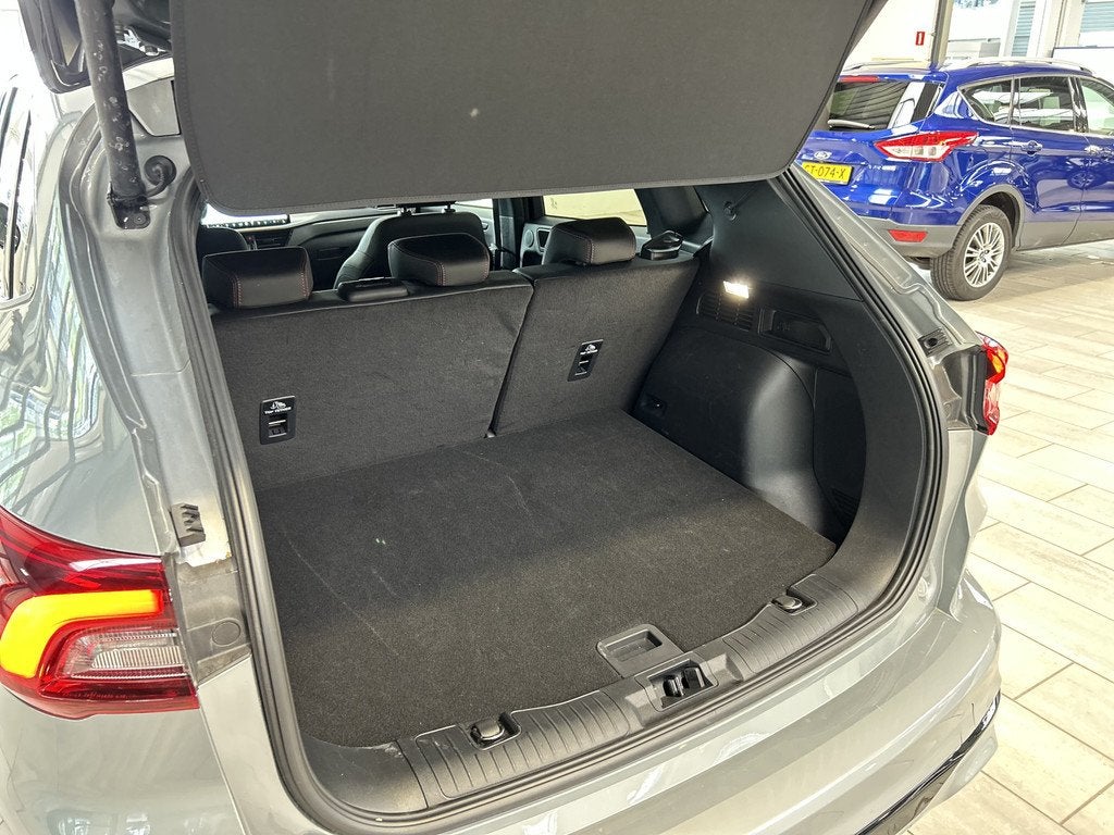 Ford Kuga 2.5 PHEV 243 pk ST-Line X I AGR stoelen | Adapt Cr, Auto's, Ford, 12 maanden, 14 kWh, Gebruikt, Zwart