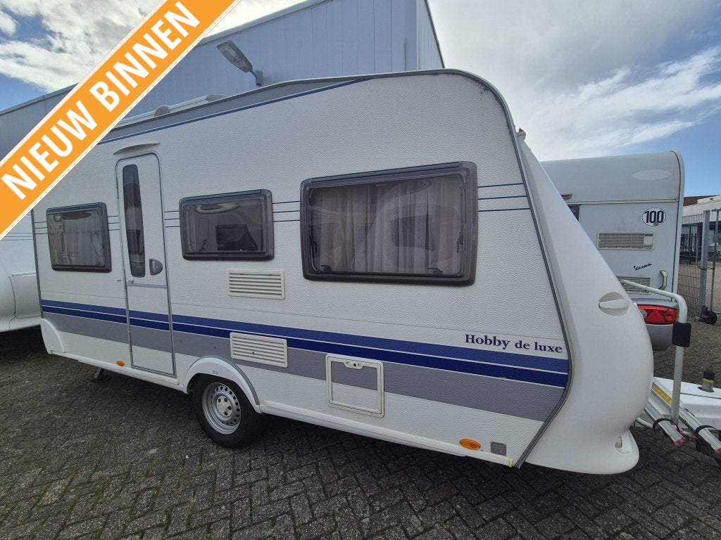 Hobby De Luxe 450 UF 2007 voortent, fietsenrekken 8250,-, Caravans en Kamperen, Rondzit, Hobby, 750 - 1000 kg, Particulier
