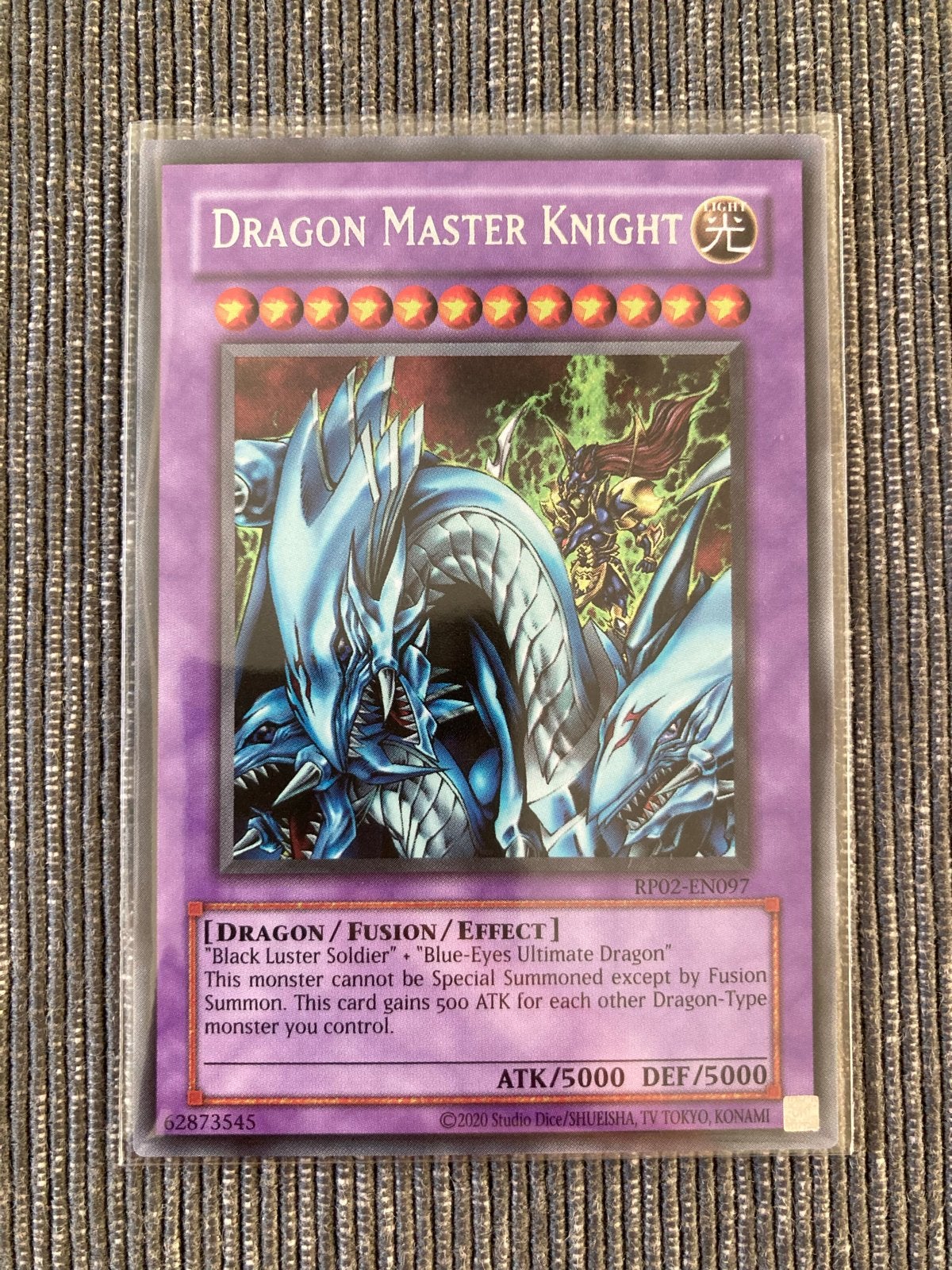 Dragon Master Knight Yu-Gi-Oh! Kaart RP02-EN097, Ophalen of Verzenden, Zo goed als nieuw, Losse kaart, Foil