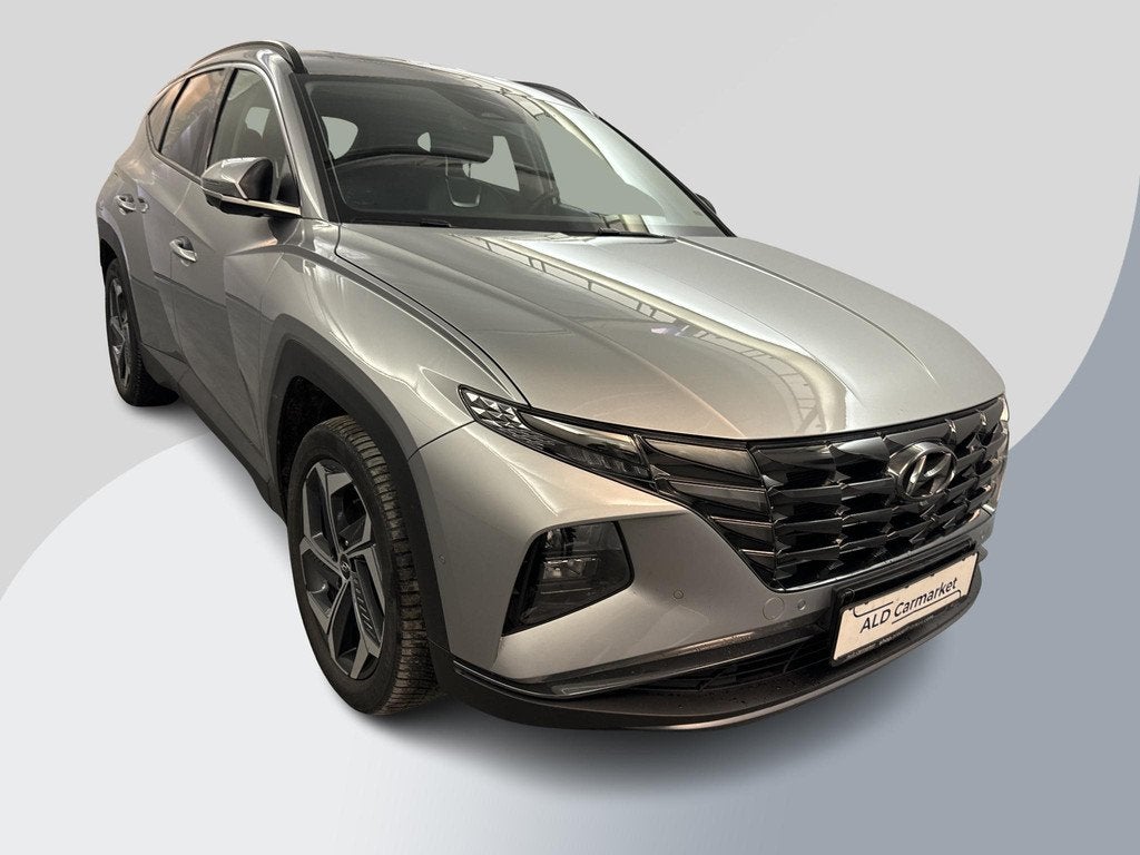 Hyundai Tucson 1.6 T-GDI PHEV Premium 4WD 32300 KM | Lederen, Auto's, Hyundai, Automaat, 14 kWh, Gebruikt, Euro 6