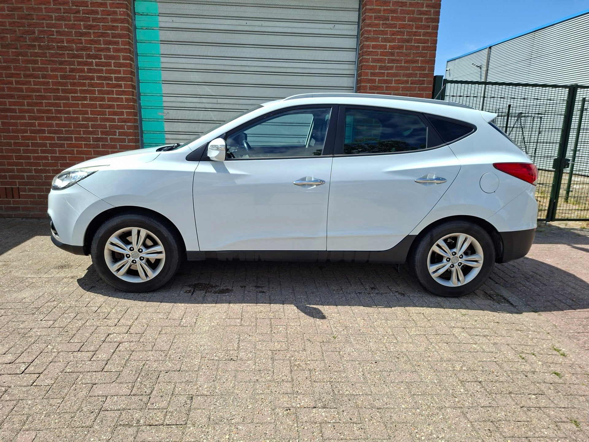 Hyundai Ix35 2.0i Style Clima NAP, Gebruikt, 4 cilinders, Automatische klimaatregeling, Leder en Stof