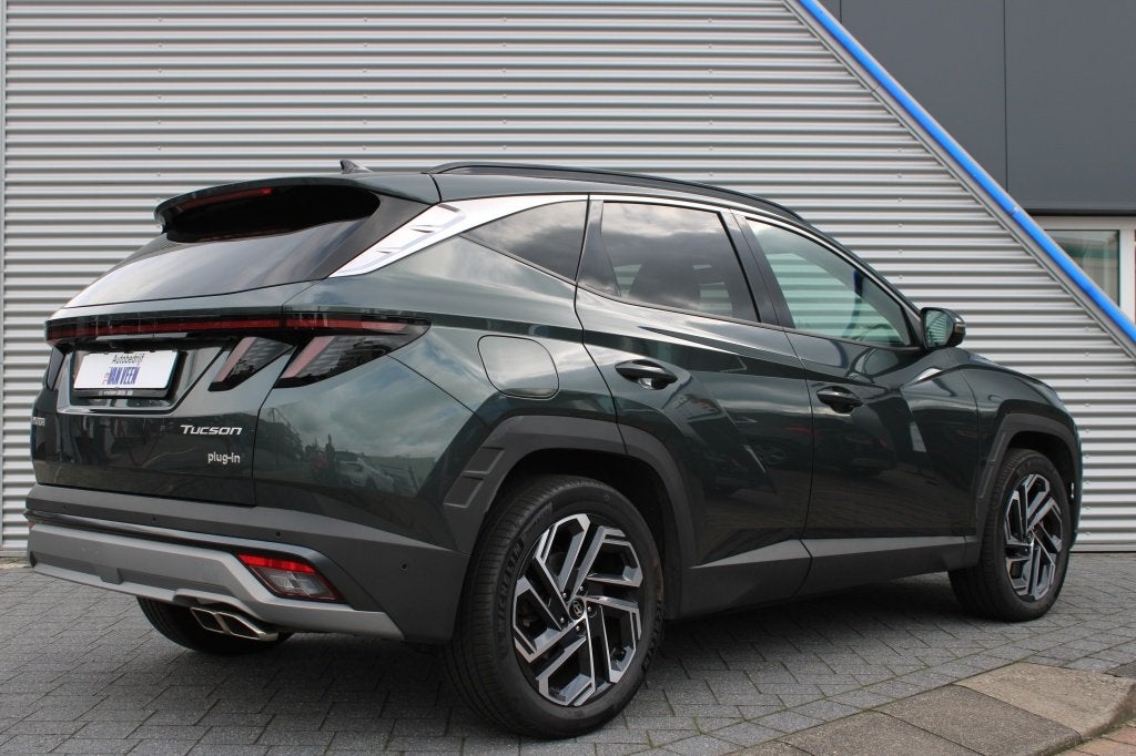 Hyundai Tucson 1.6 T-GDI PHEV 2WD Premium Sky | Leer | 360 c, Automaat, Dealer onderhouden, 4 cilinders, Bedrijf