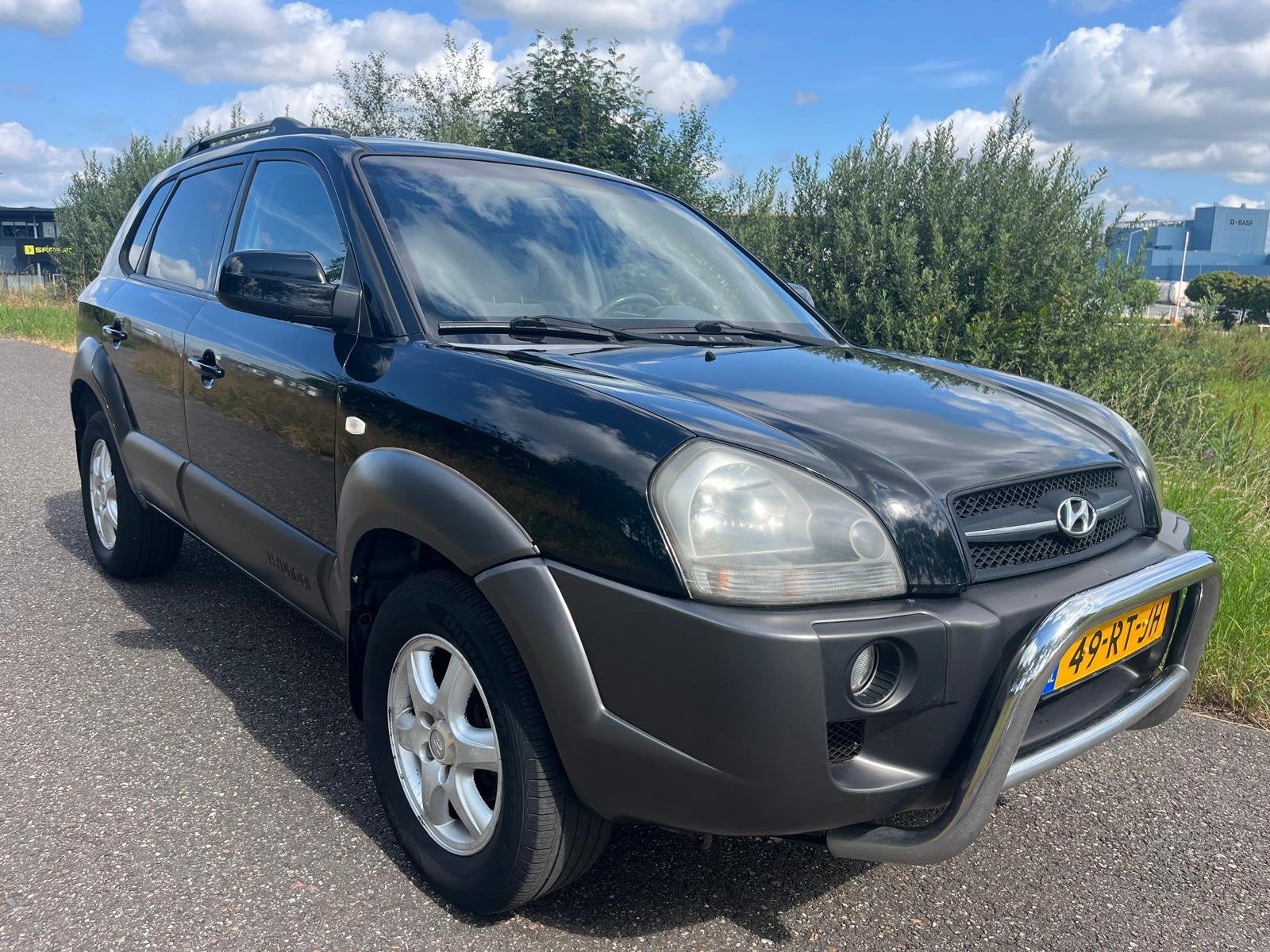 Hyundai Tucson 2.0i | Airco | Cruise | Trekhaak | APK mei 20, Auto's, Gebruikt, 4 cilinders, Zwart, Origineel Nederlands