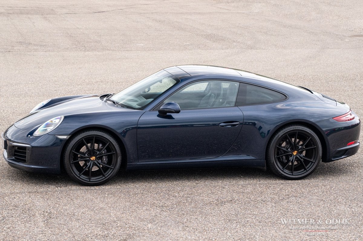 Porsche 911 3.0 Carrera Night Blue, Panoramadak (bj 2018), Dealer onderhouden, Achterwielaandrijving, Gebruikt, Zwart