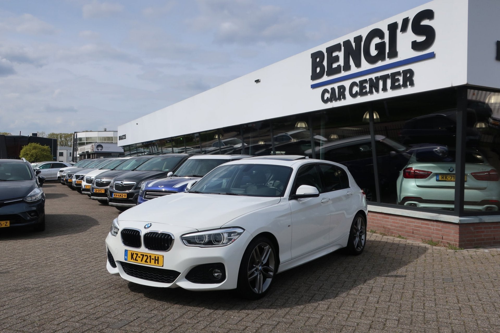 BMW 1-serie 118i Centennial High Executive DealerOH_LED_1eEi, Auto's, BMW, Gebruikt, Wit, Bedrijf, 650 kg