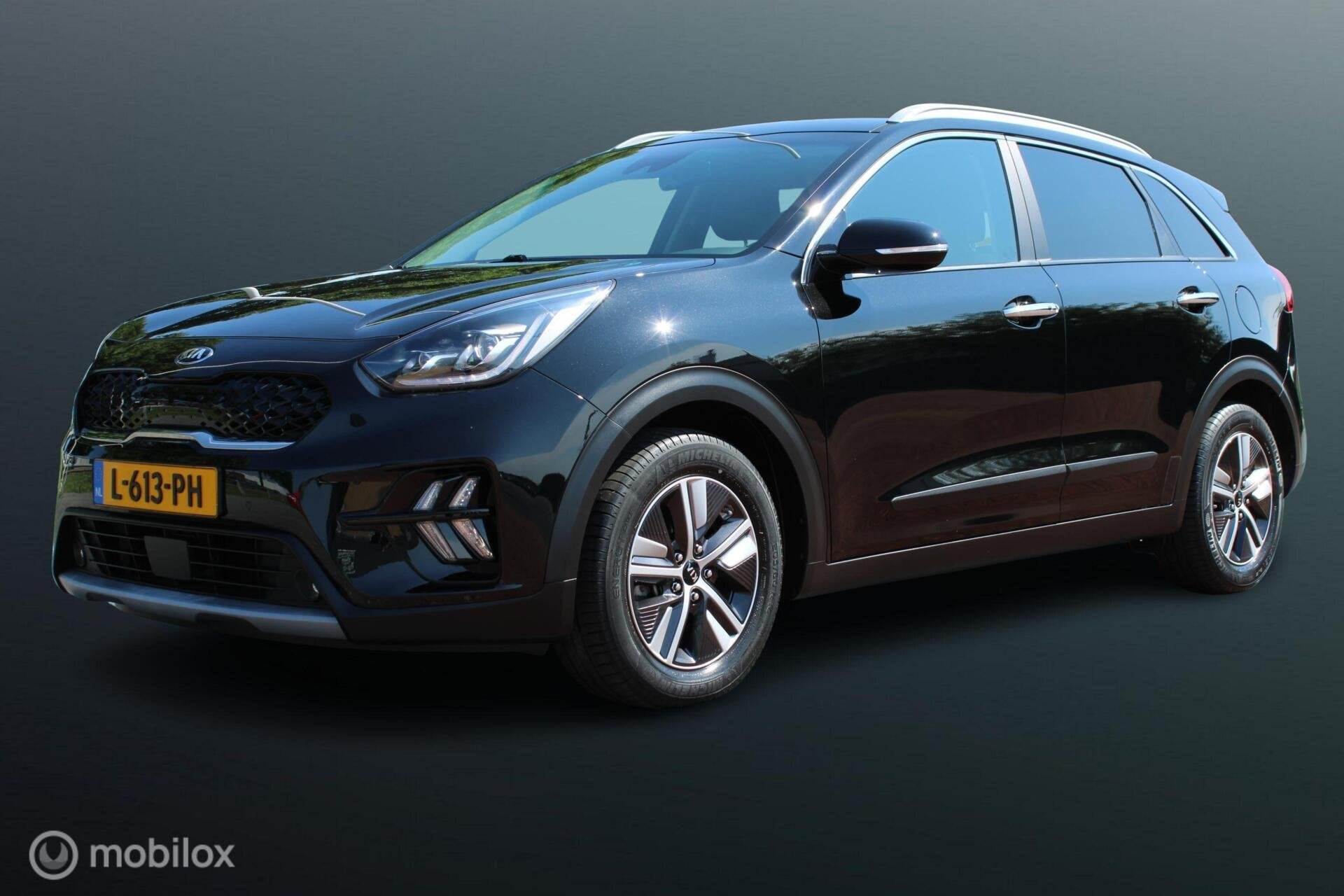 Kia Niro 1.6 GDi Hybrid 140 PK DynamicPlusLine, Stoel-stuurv, Gebruikt, Zwart, Automatische klimaatregeling, 1390 kg