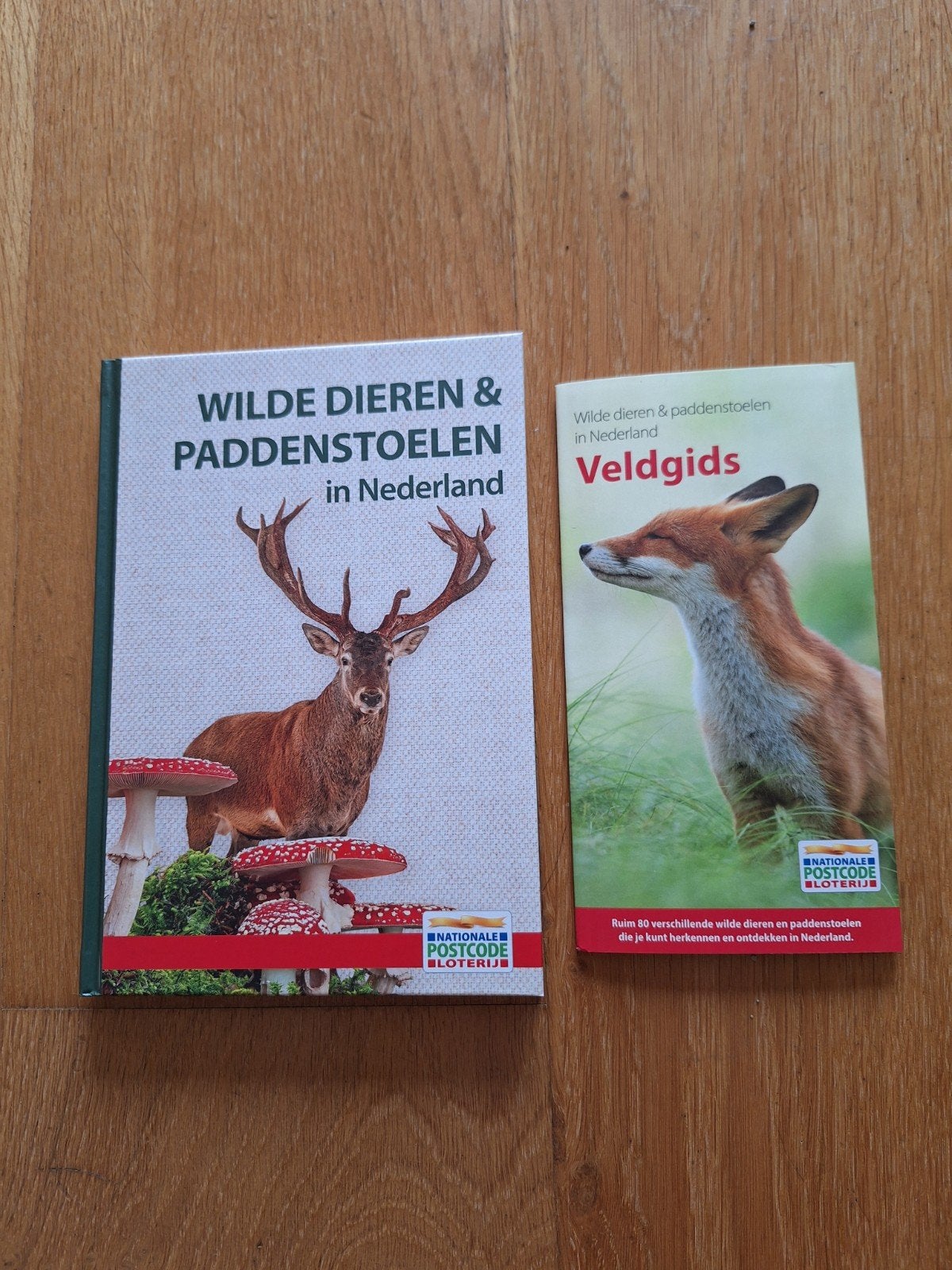 Boek postcode loterij: wilde dieren en paddenstoelen, Ophalen of Verzenden, Nieuw, Natuur algemeen