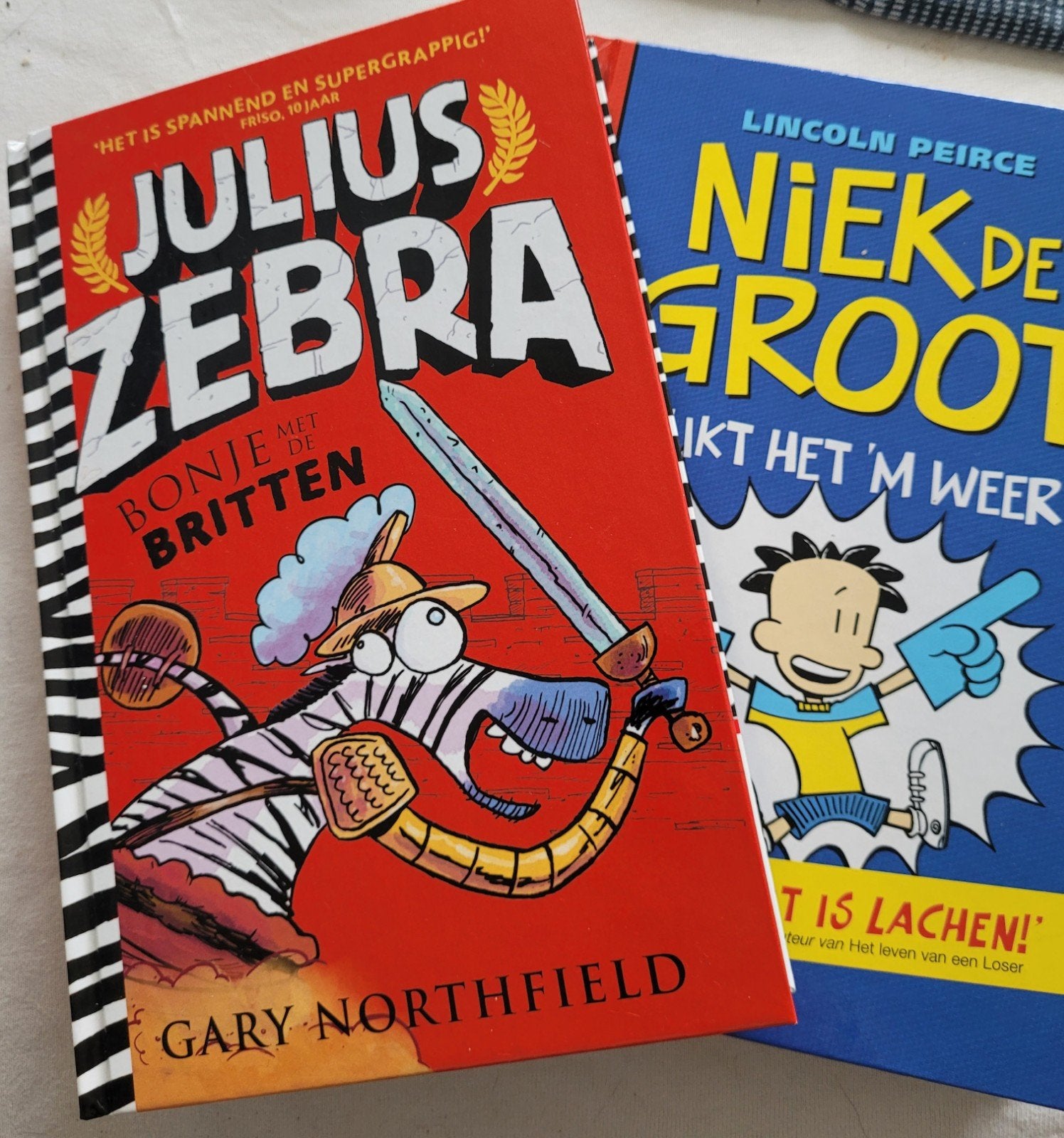 2 kinderboeken Julius Zebra en Niek de Groot, Ophalen of Verzenden, Zo goed als nieuw
