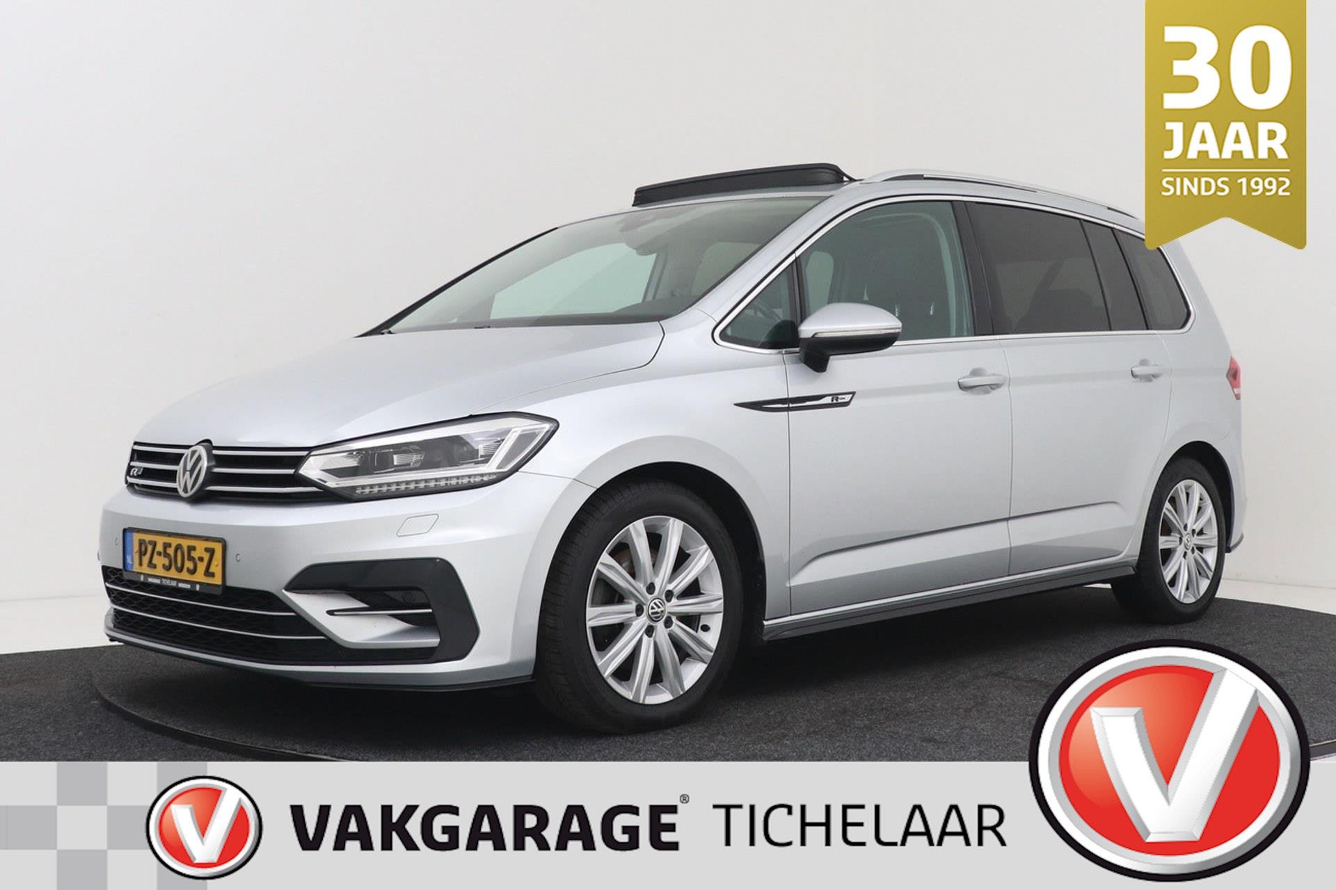 Volkswagen Touran 1.8 TSI Highline Business R-Line 7p | Trek, Stof, Gebruikt, 4 cilinders, 1462 kg