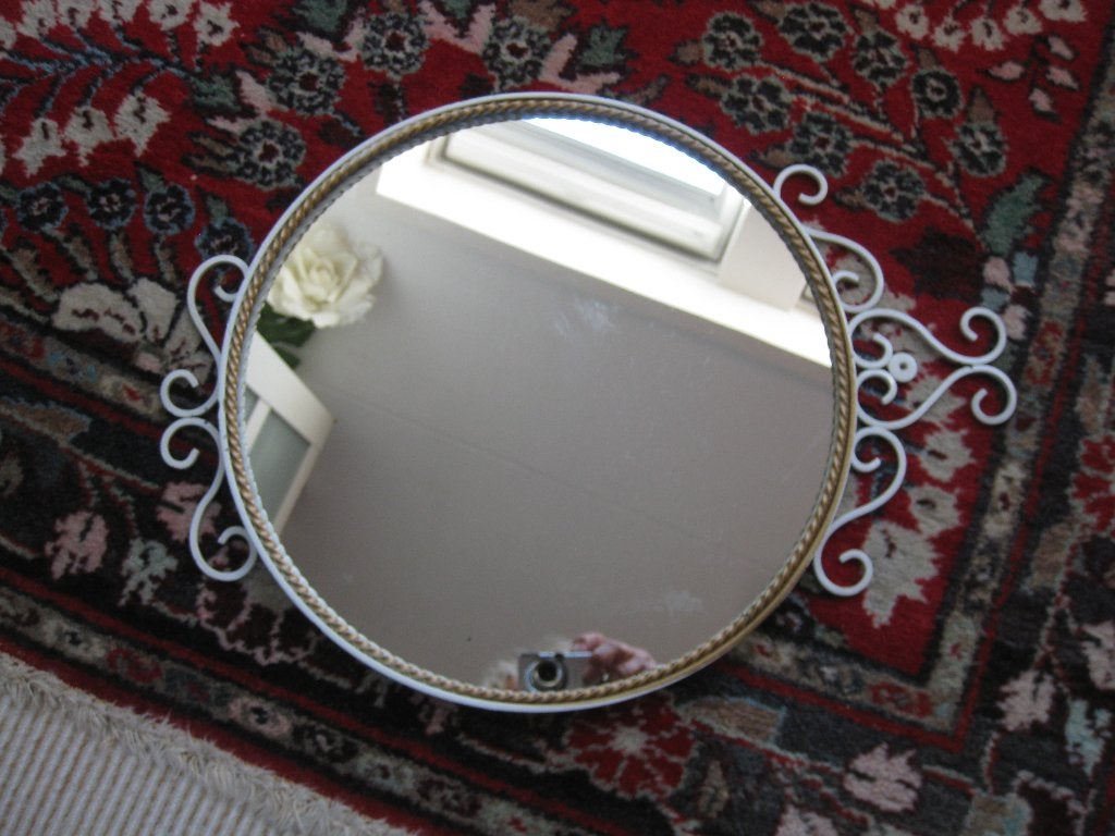Decoratieve smeedijzeren spiegel., Ophalen of Verzenden, Overige vormen, Minder dan 50 cm