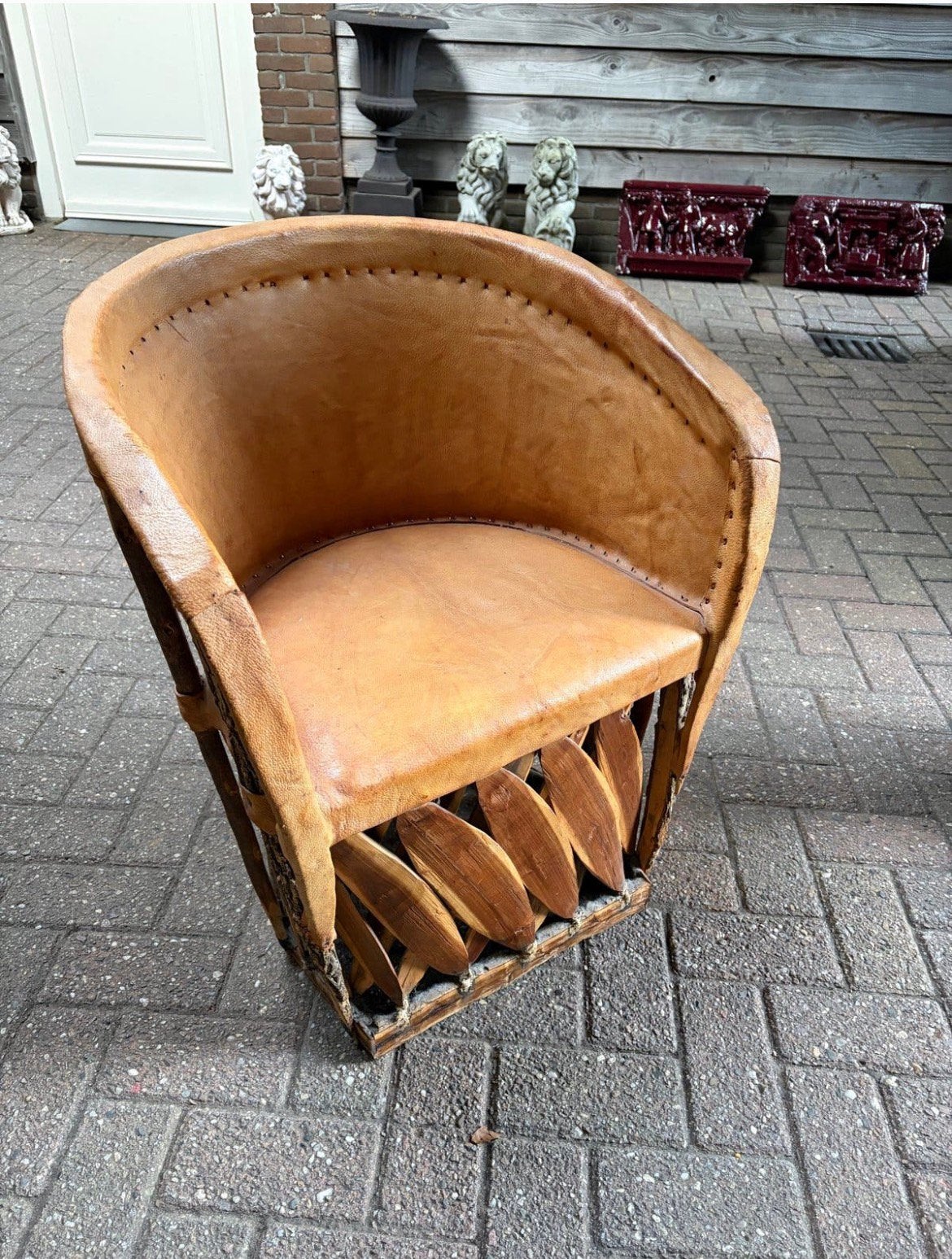 Vintage Afrikaanse stoel van leer en hout, Antiek en Kunst, Ophalen