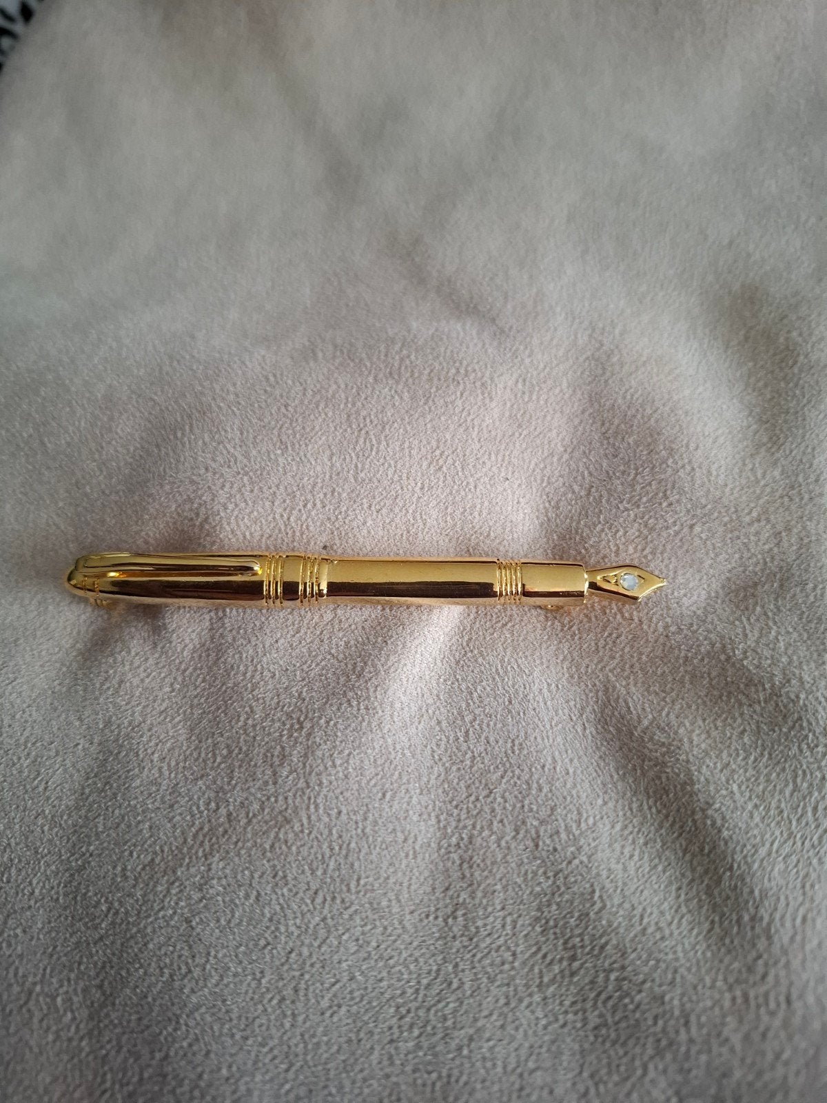 Goudkleurige vulpen broche, Overige materialen, Ophalen of Verzenden, Zo goed als nieuw, Goud