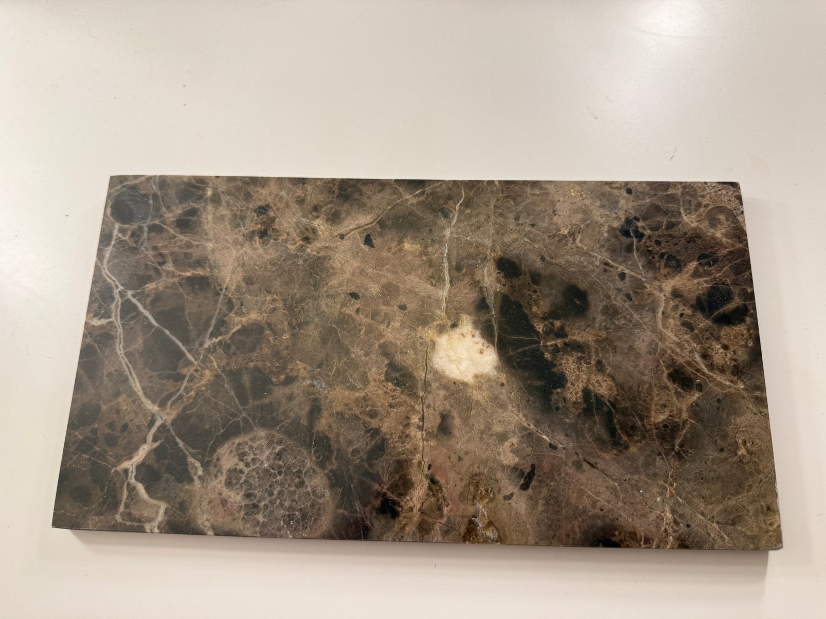 Onderlegger Marble, Ophalen, Gebruikt