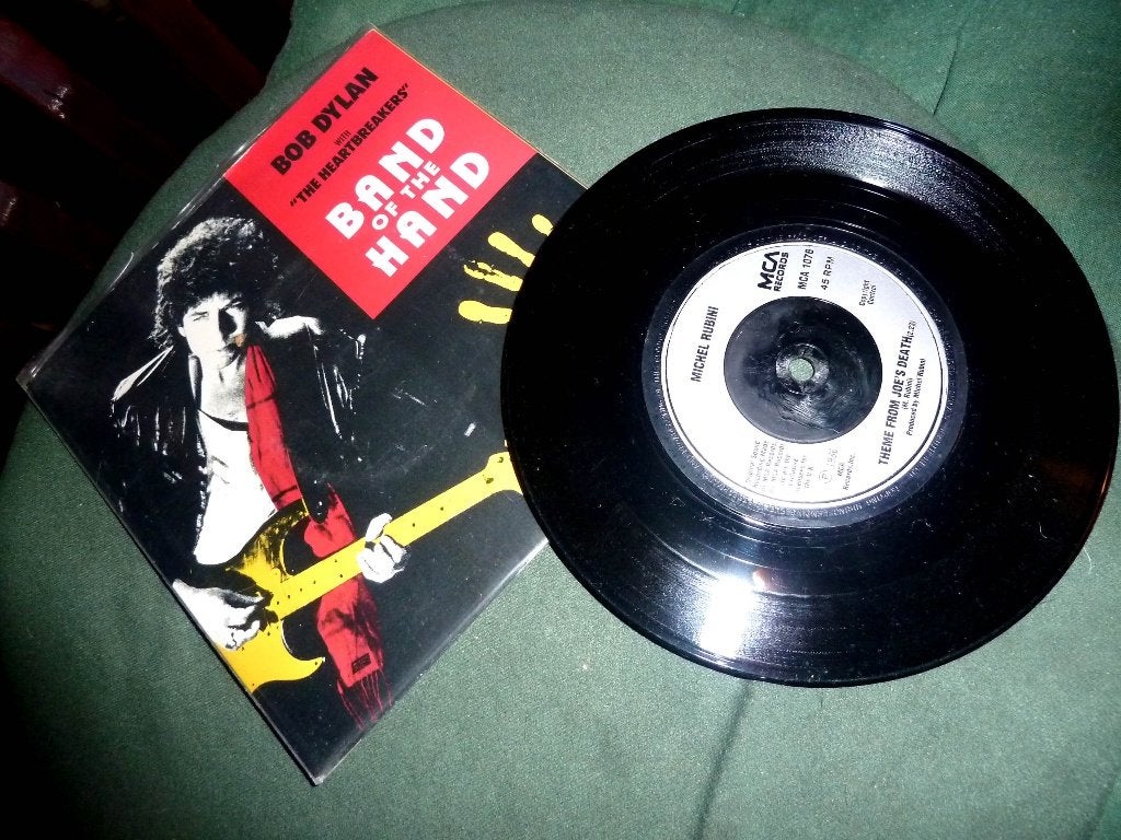 single Bob Dylan Band of the Hand - Theme - UK - 1986, Ophalen of Verzenden, Gebruikt, Pop