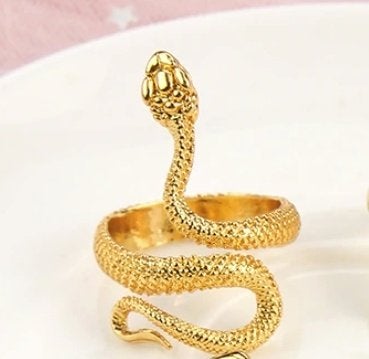 Slang stalen ring in goud kleur, Sieraden, Tassen en Uiterlijk, IJzer of Staal, Nieuw, Ophalen of Verzenden, 17 tot 18
