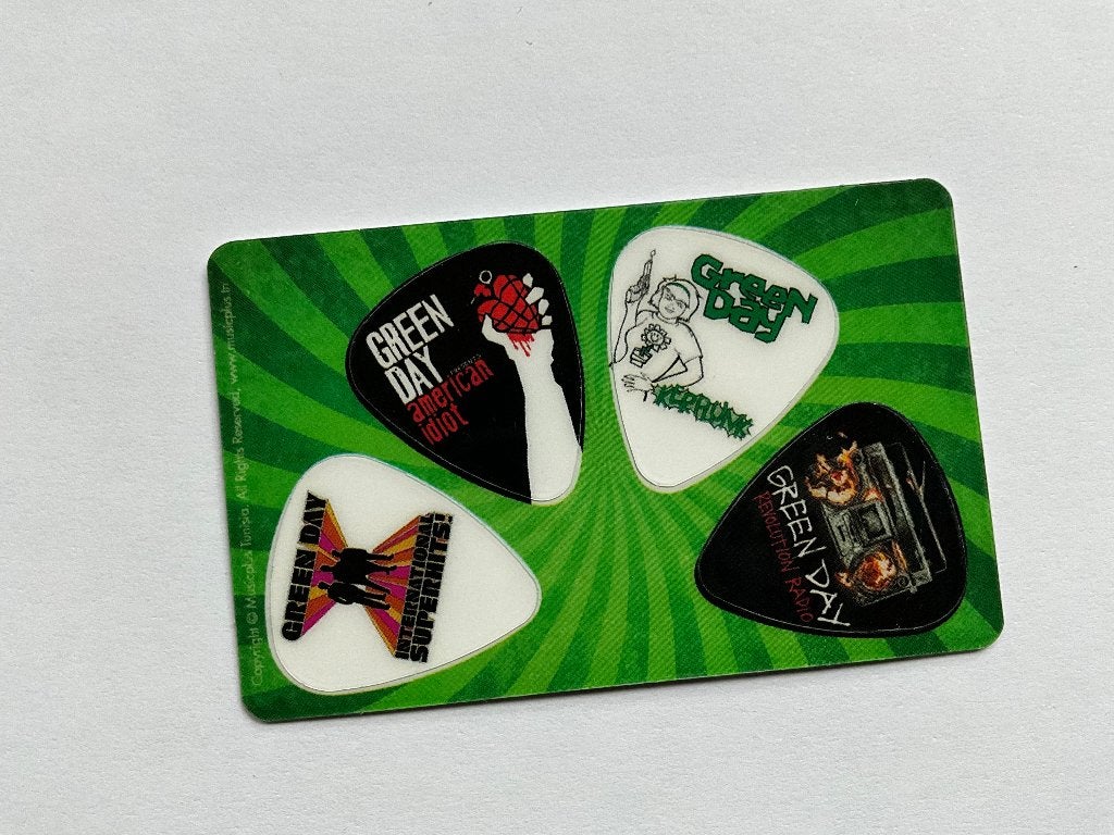 4 uitneembare plectrums van Greenday, Nieuw, Ophalen of Verzenden, Foto of Kaart, 4 uitneembare plectrums van Greenday