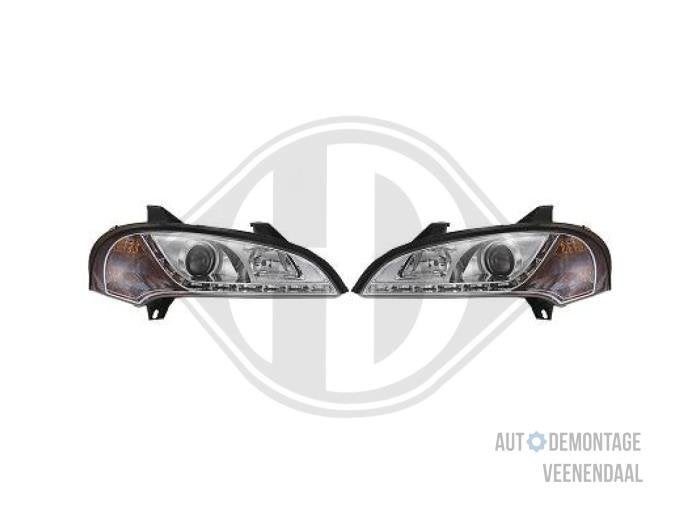 Koplampset links + rechts van een Opel Tigra, -, -, Opel, Nieuw