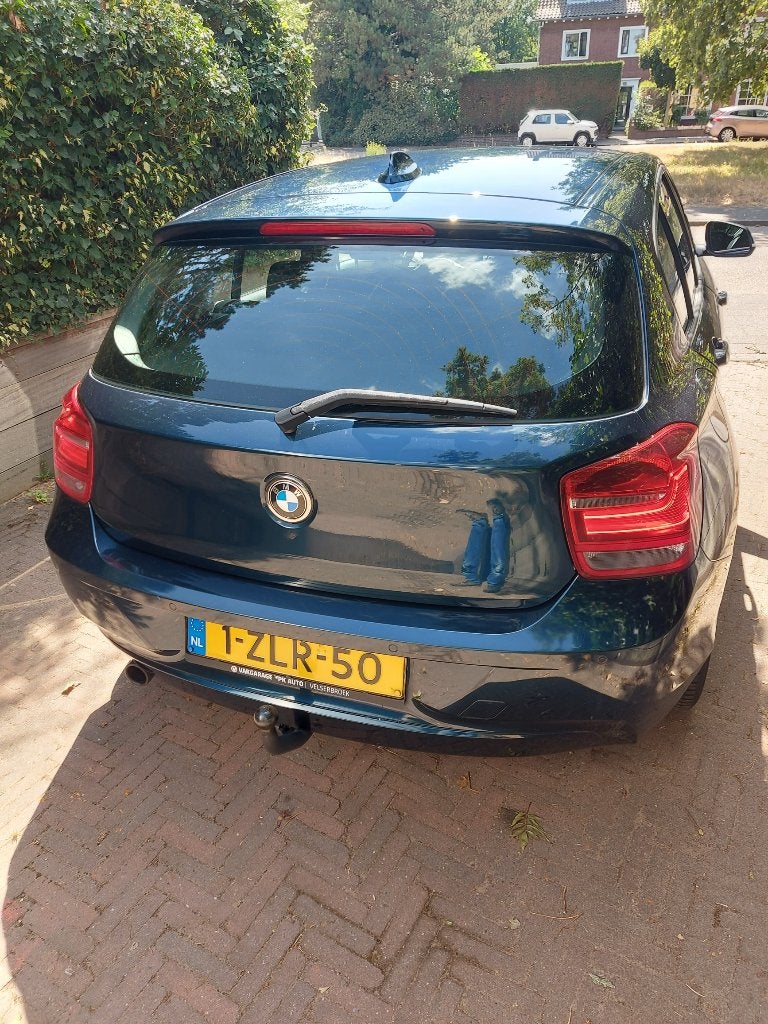 BMW 1-Serie 116i 136PK 5D 2015 Blauw, Auto's, Zwart, 4 cilinders, Blauw, Origineel Nederlands