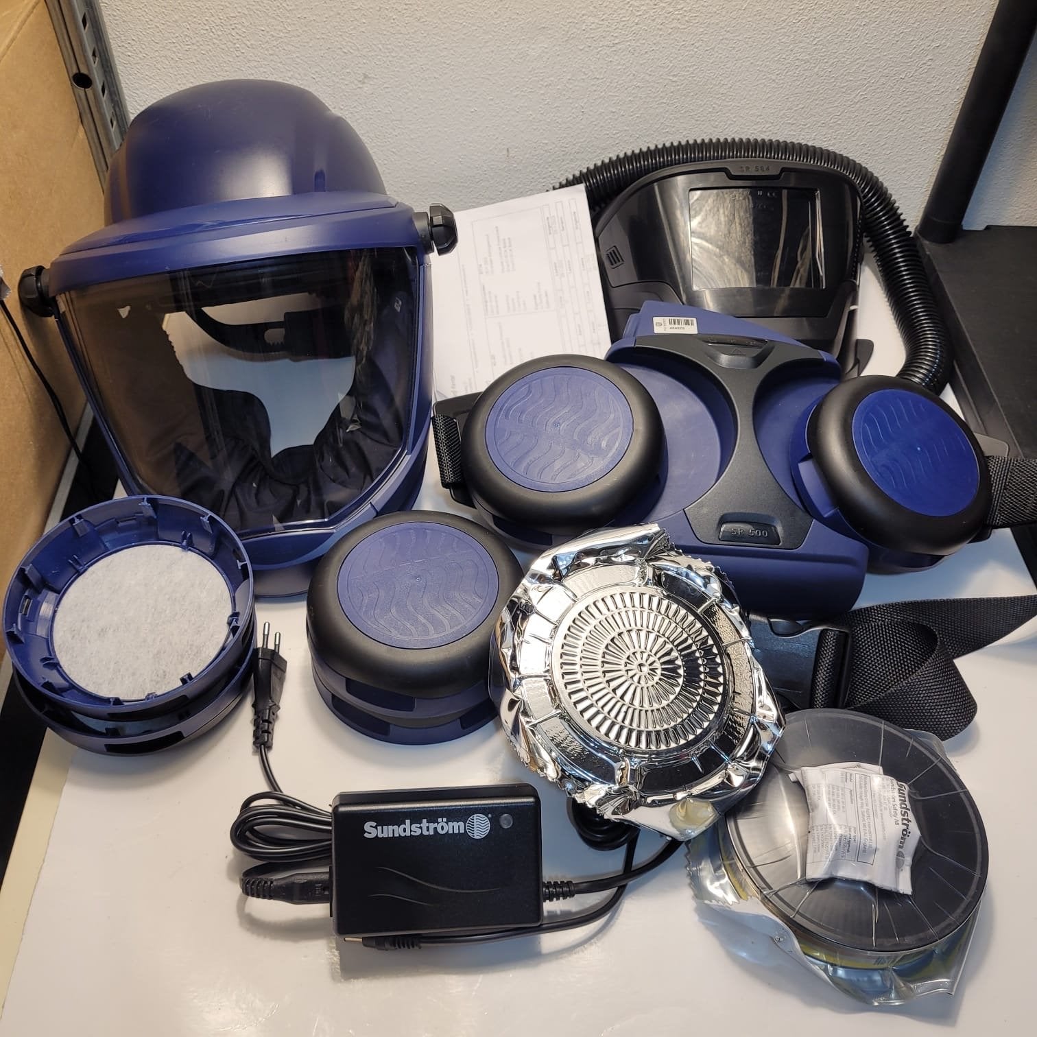 Sundström SR 500 PAPR met SR 580 en SR 584 helmen, Ophalen of Verzenden