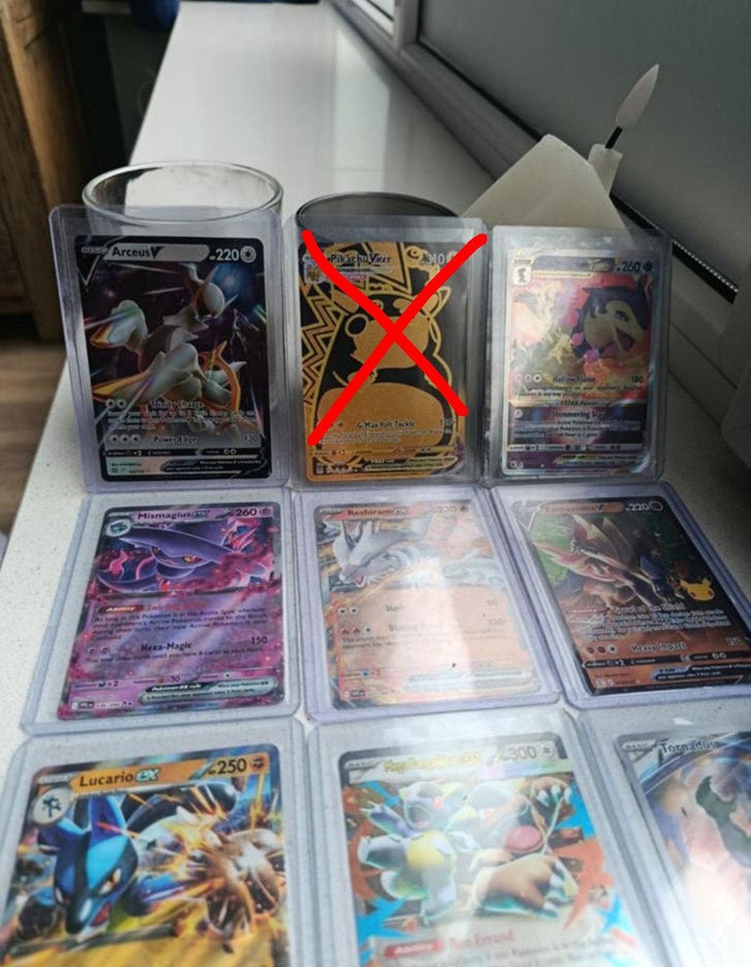 15 Pokemon kaarten in slab, Ophalen of Verzenden