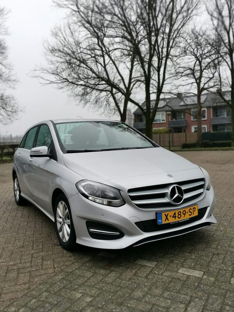 Mercedes-Benz B-Klasse 1.6 B180 5DRS BE Dct7 2017 Grijs, Auto's, 1325 kg, Zwart, 4 cilinders, 122 pk