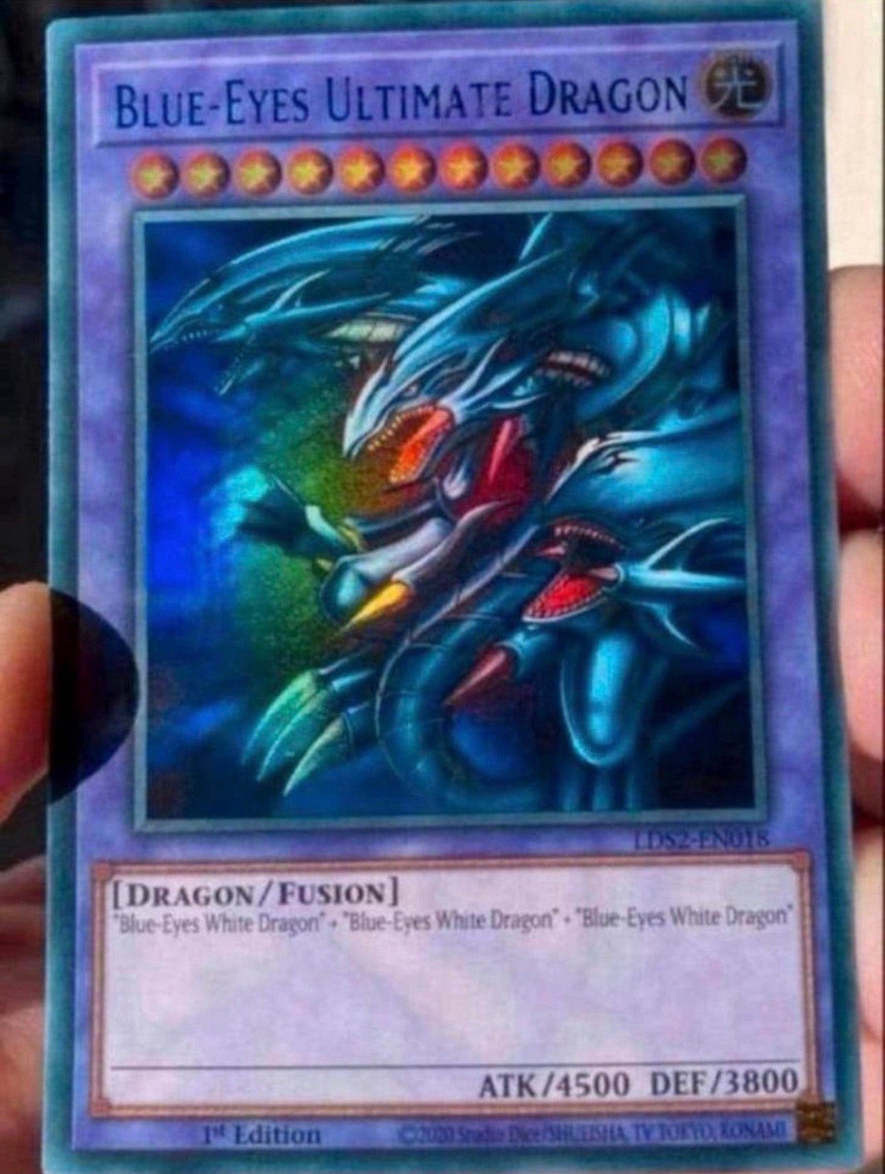 Yu-Gi-Oh! Blue Eyes Ultimate Dragon LDS2 1st Edition !, Hobby en Vrije tijd, Ophalen of Verzenden, Gebruikt, Losse kaart, Foil