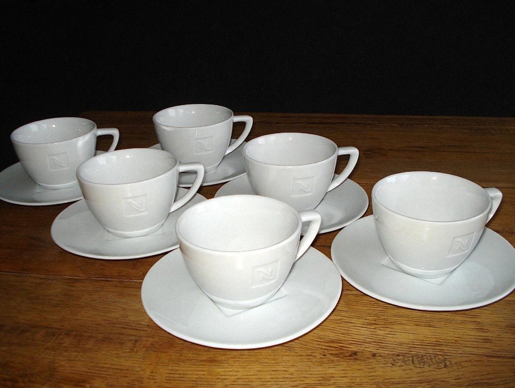Nieuw: 6x Nespresso (Lungo / cappuccino) kop en schotels