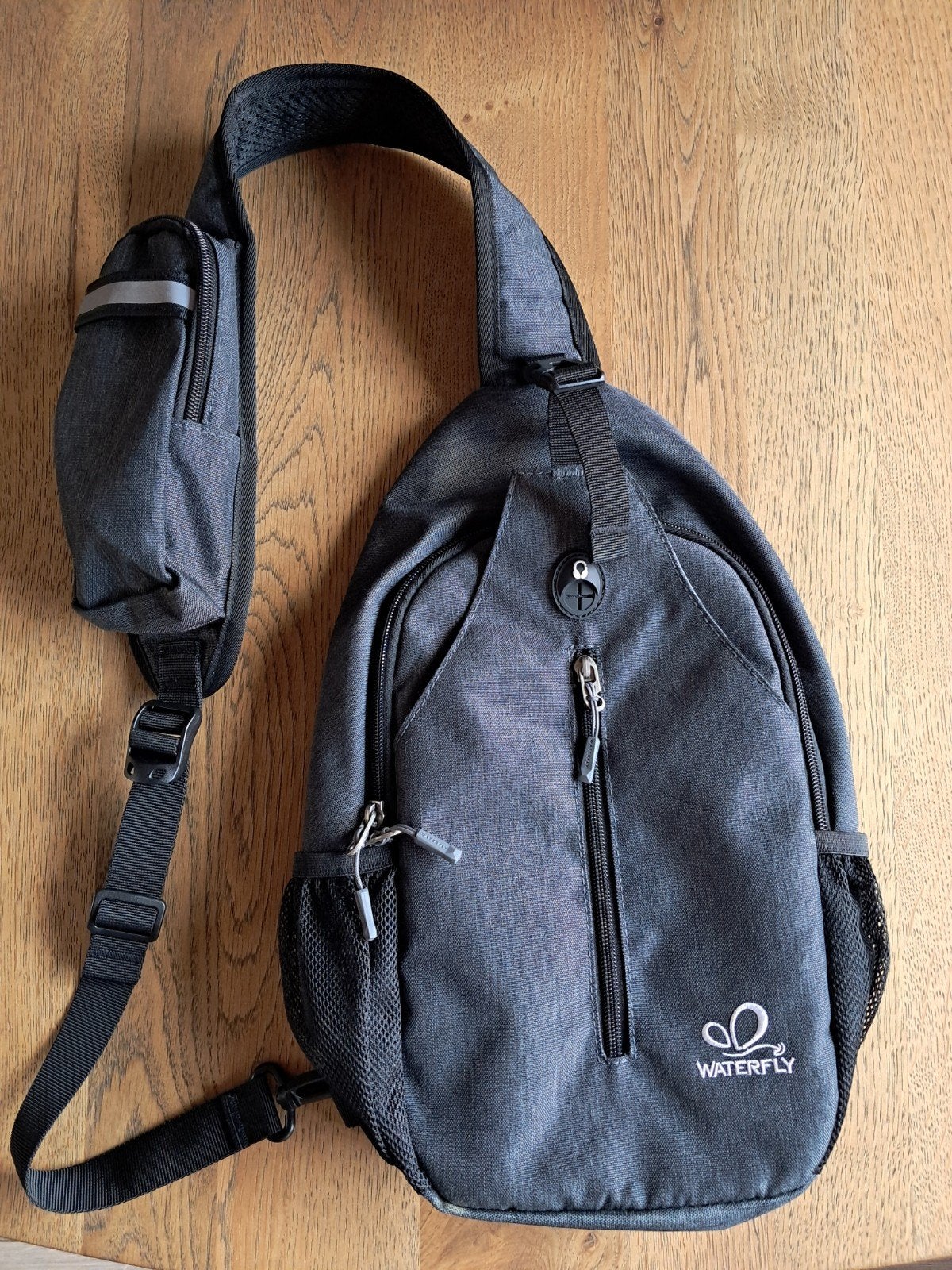 Waterfly sling bag, Sieraden, Tassen en Uiterlijk, Tassen | Rugtassen, Ophalen of Verzenden, Zo goed als nieuw, Overige merken