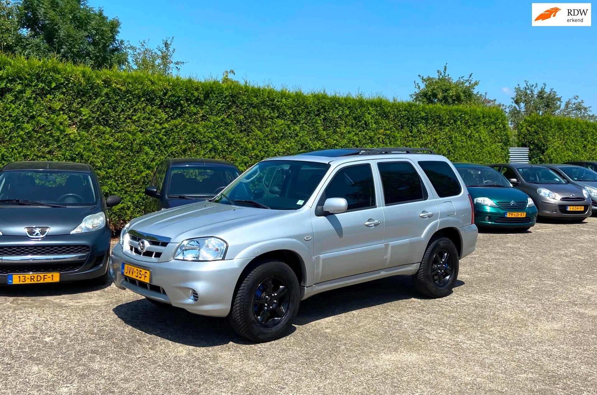 Mazda Tribute APK NIEUW LEER AIRCO CC NETTE AUTO AUTOMAAT 3., Gebruikt, 680 kg, 1553 kg, Leder