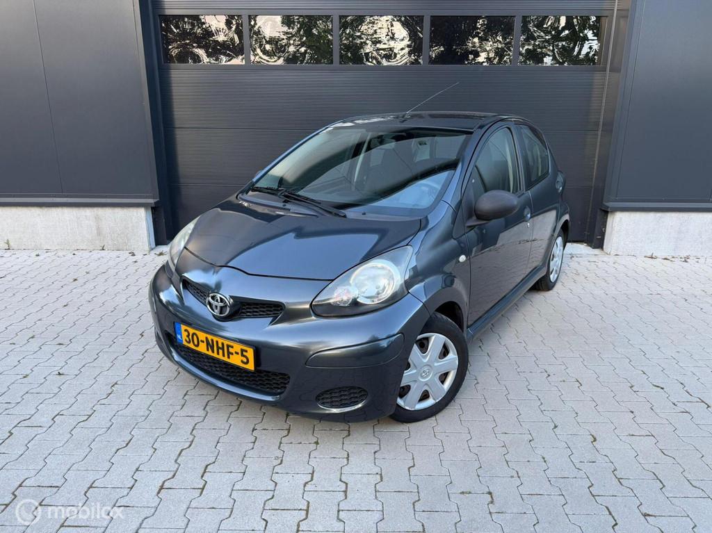 Toyota Aygo 1.0-12V Access Airco Elecktr Ramen 2e Eig APK, Auto's, Voorwielaandrijving, Stof, Gebruikt, Zwart