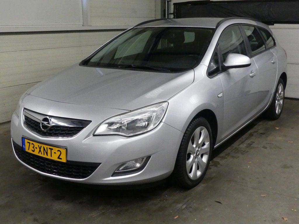 Opel Astra Sports Tourer 1.4 Cosmo - Navigatie, Auto's, Voorwielaandrijving, Euro 5, Gebruikt, 4 cilinders