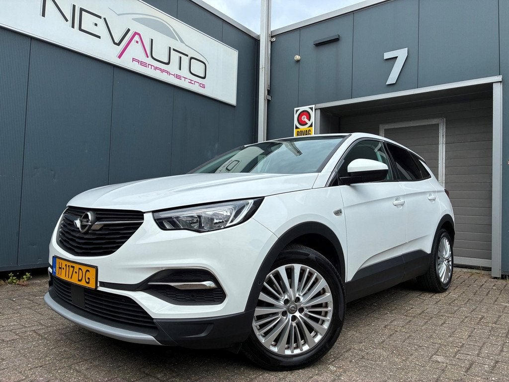 Opel Grandland X 1.2 Turbo Business Executive Trekhaak Dashc, Auto's, Gebruikt, 1199 cc, Leder en Stof, Wit
