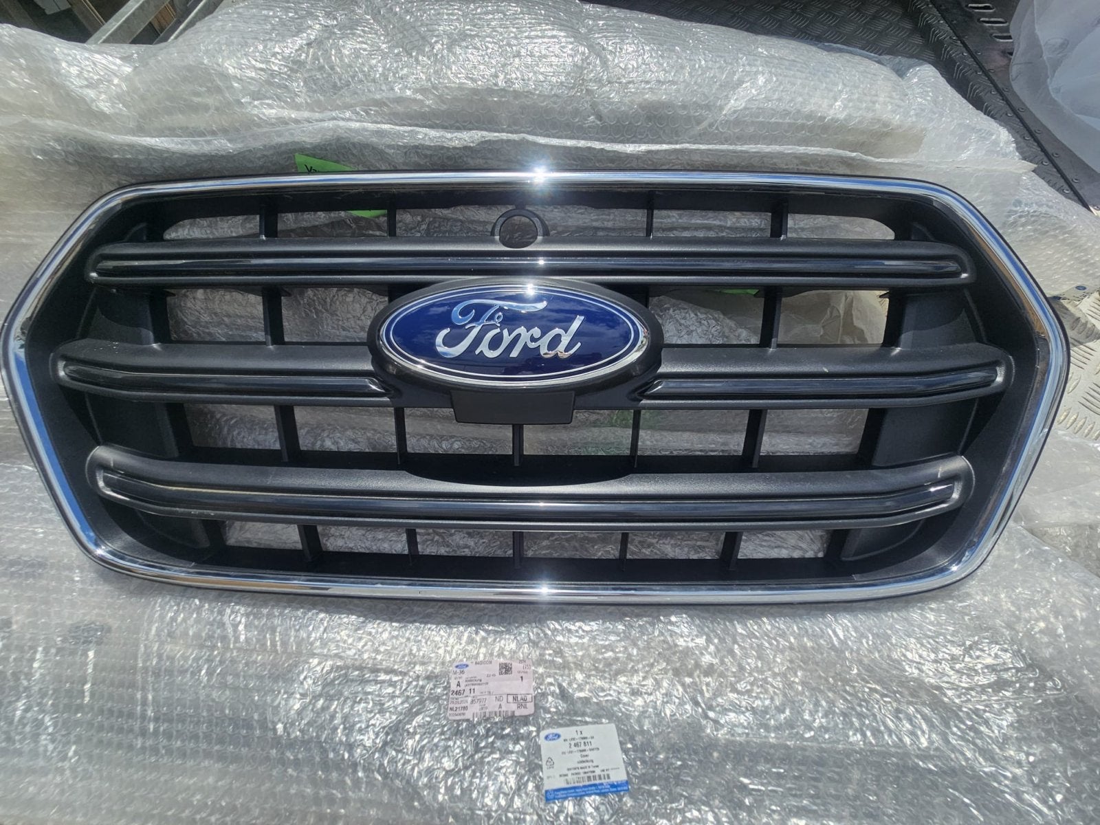 Ford Transit Grille Origineel - Nieuw Staat, Voor, Nieuw, Ophalen of Verzenden, Ford