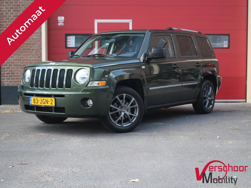 Jeep Patriot 2.4 Ltd Liberty | Cruise | Leder | Stoelverwarm, Auto's, Jeep, Automaat, 450 kg, Gebruikt, Zwart