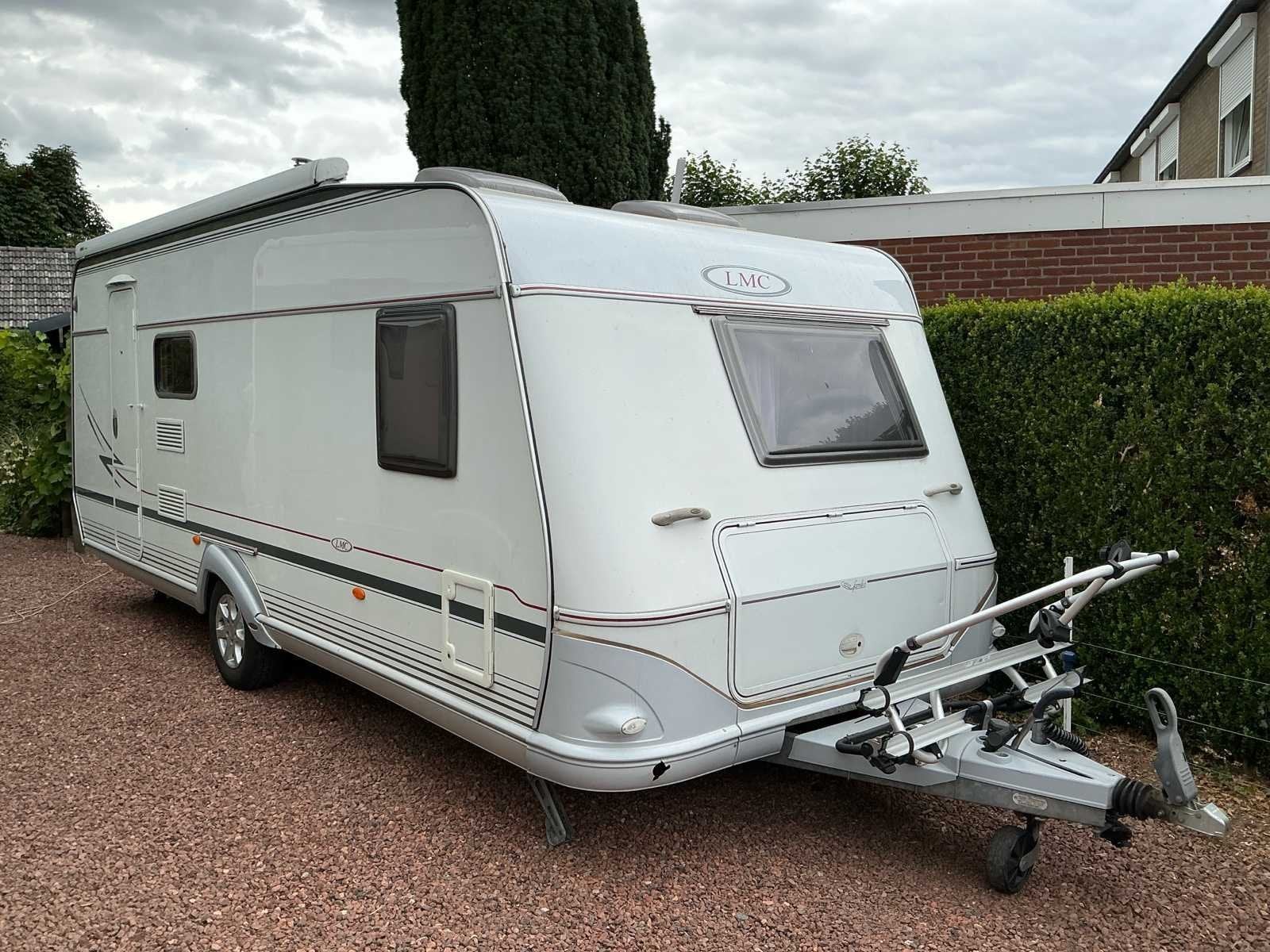 2006 LMC 560 P1 Toercaravan, met mover, Thule Omnistor luife, Bedrijf, 1000 - 1250 kg, LMC en Münsterland