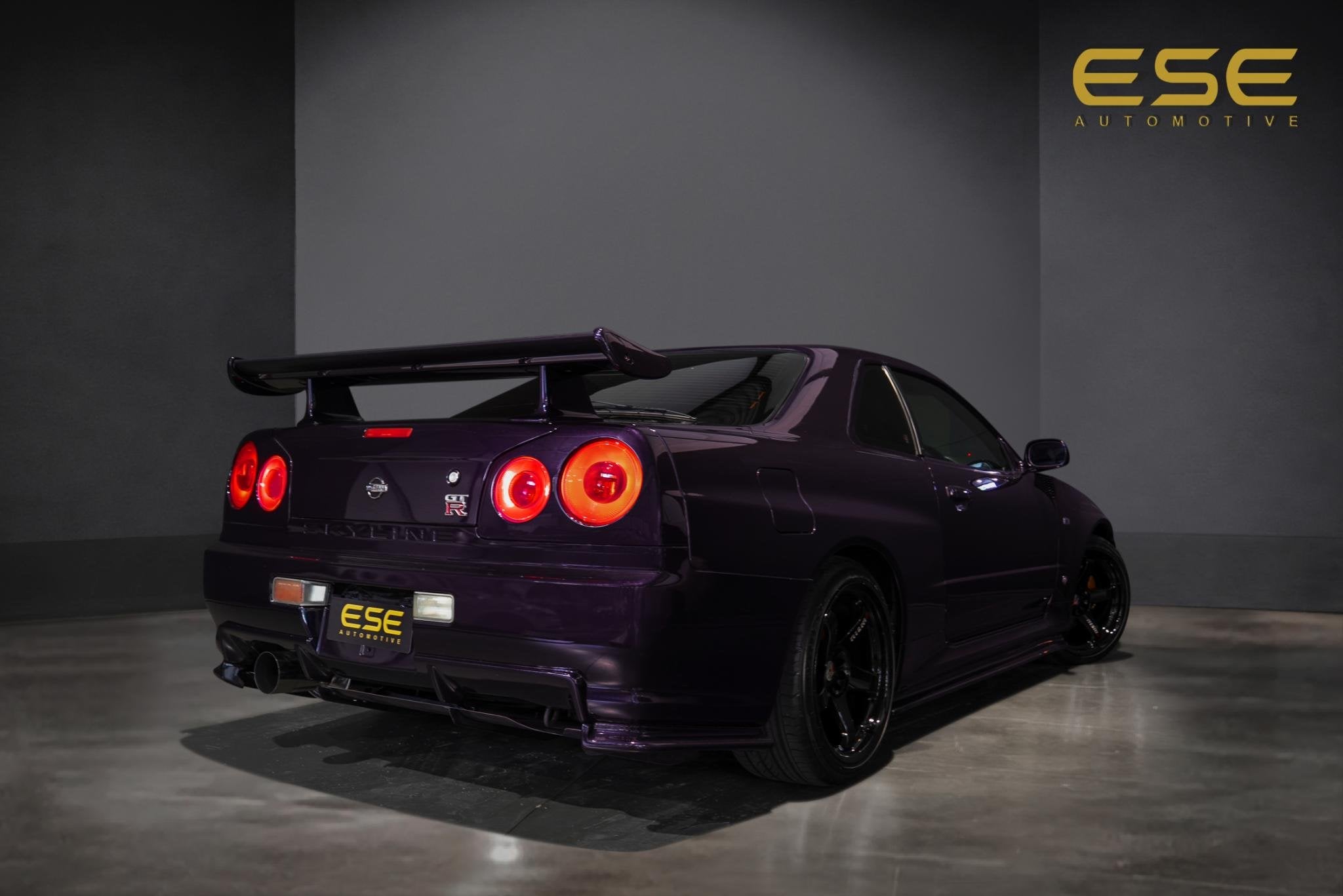 Nissan Skyline R34 GTR V-spec Midnight Purple II, Auto's, Nissan, Euro 2, Stof, Gebruikt, Zwart
